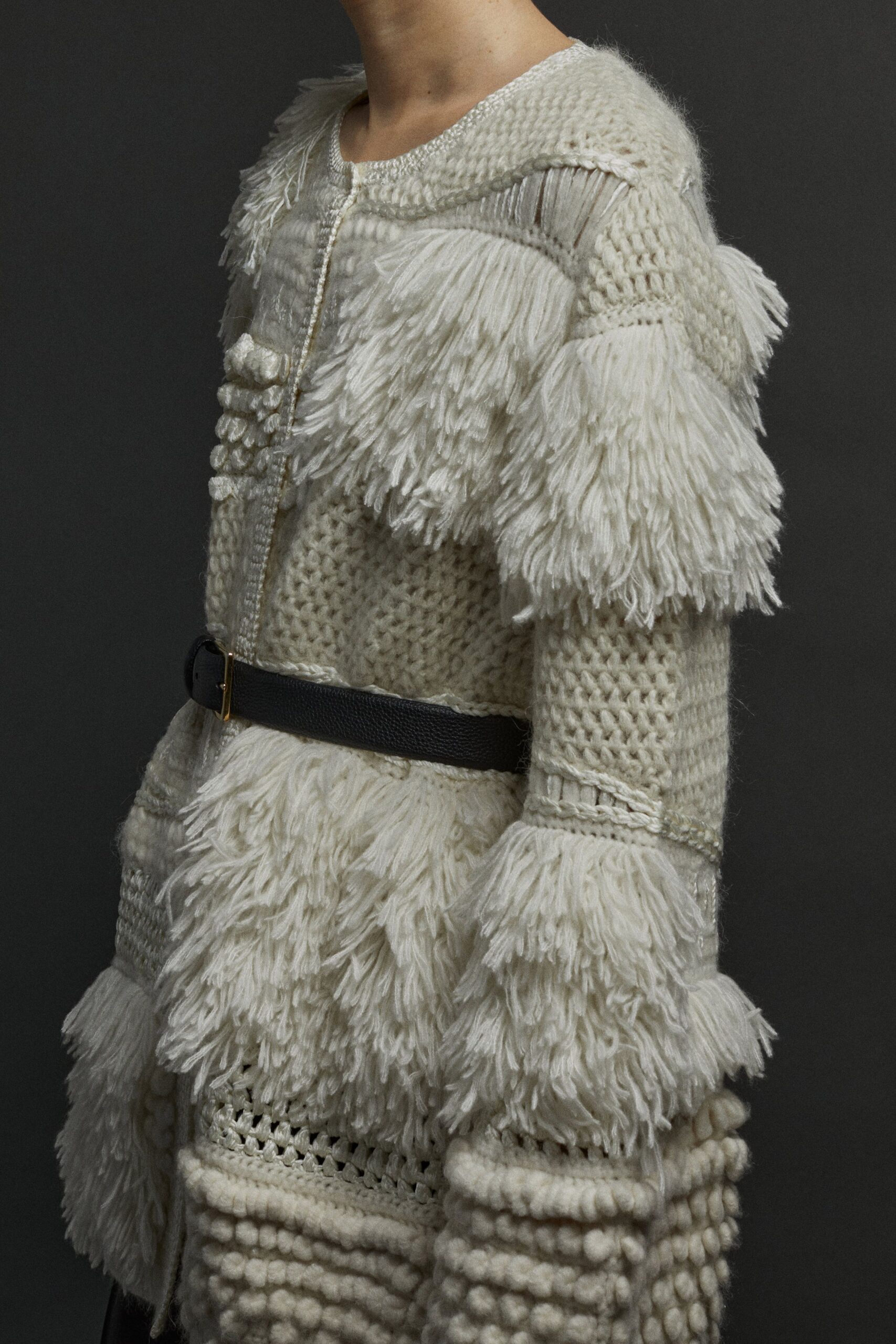 white wool long-sleeve collared relaxed fringed layered coat