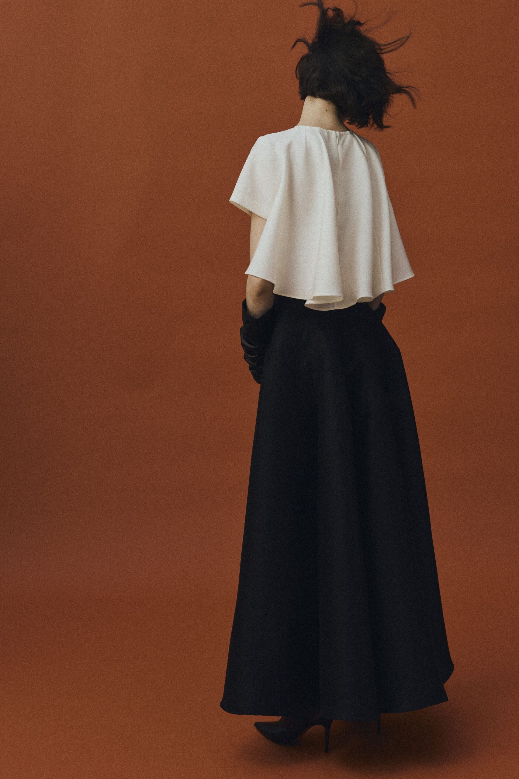 white silk short-sleeve high-neck fitted layered top