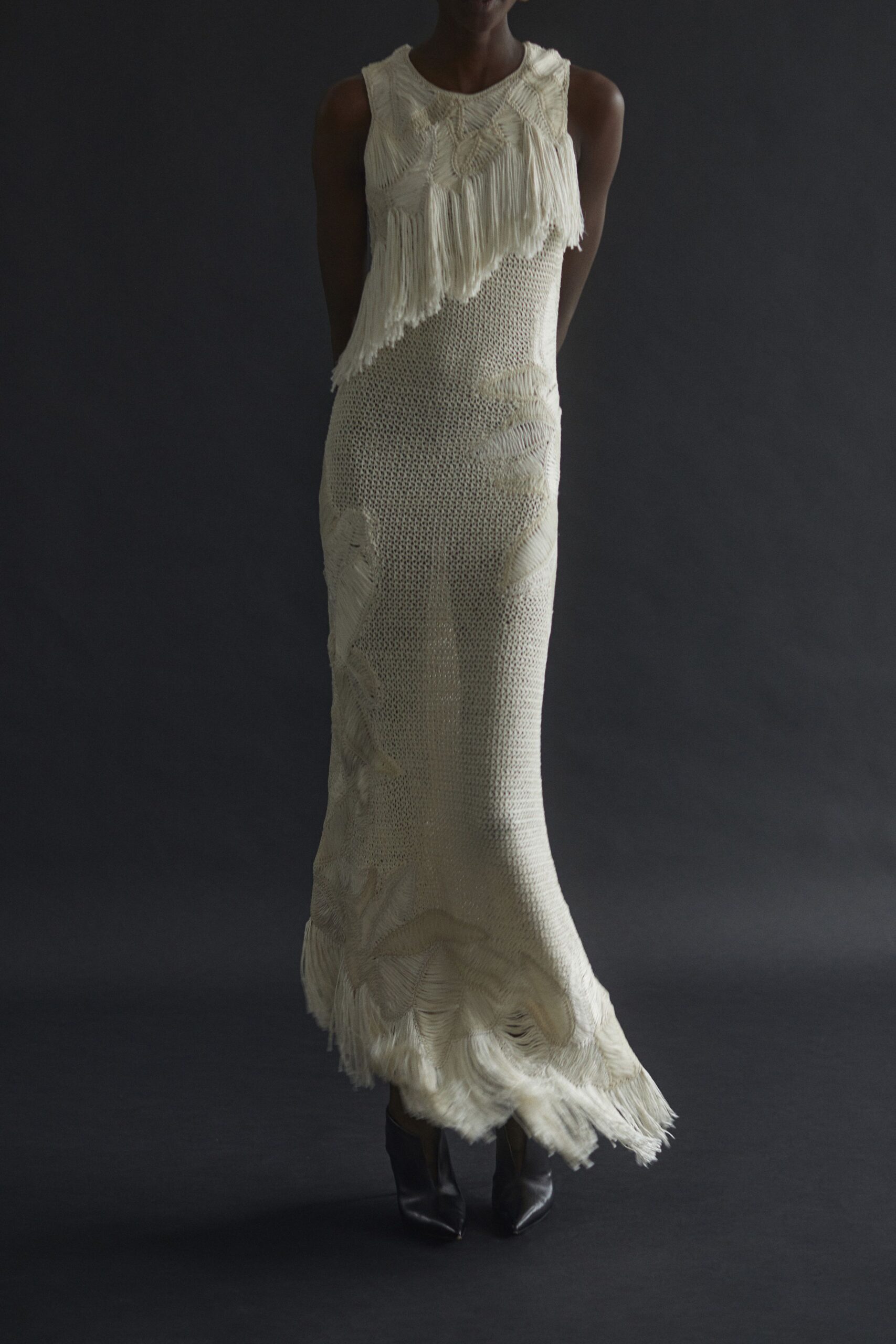 ivory fringed gown with black shoes