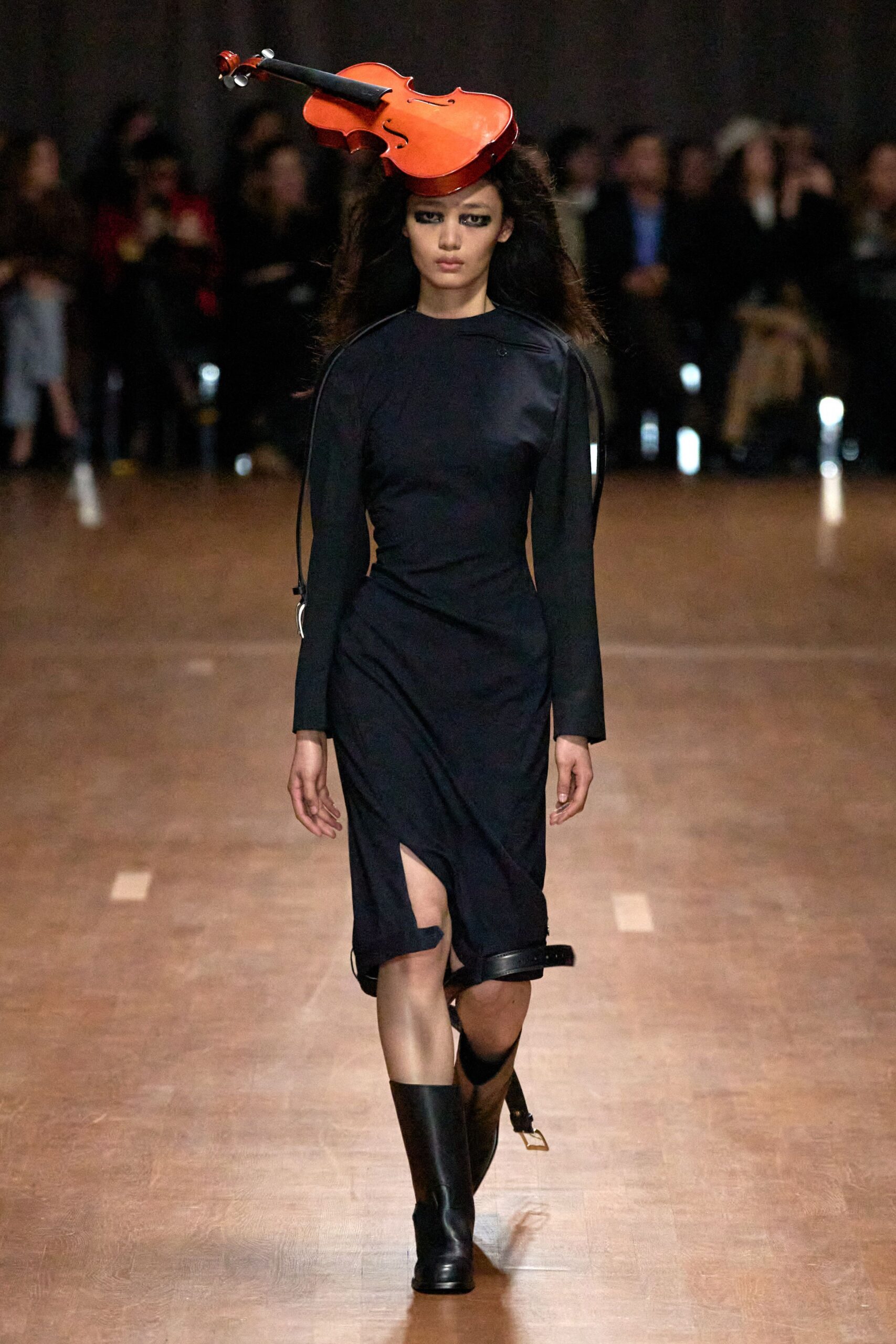 black fitted midi dress with boots