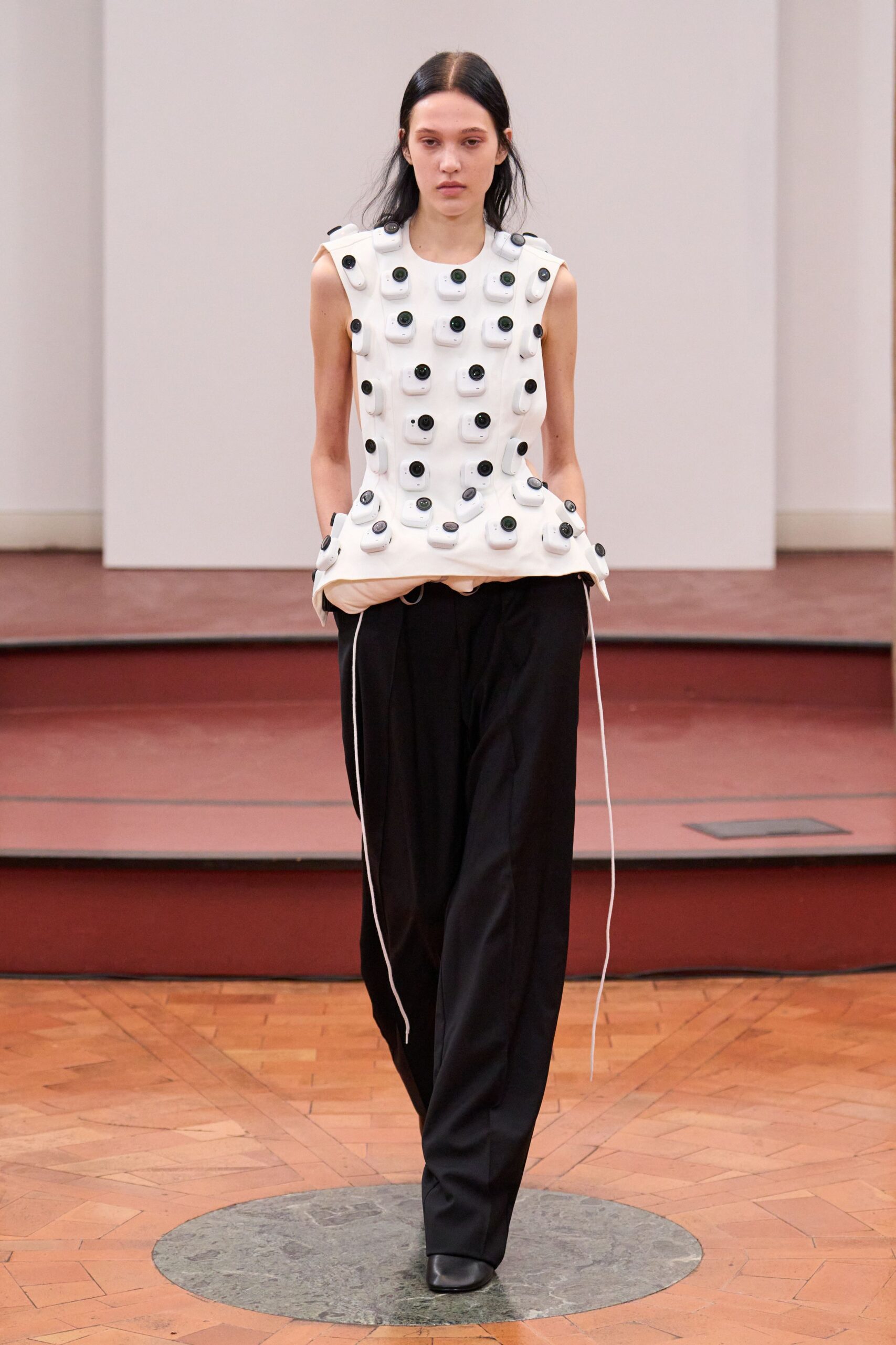 white fitted top black pants