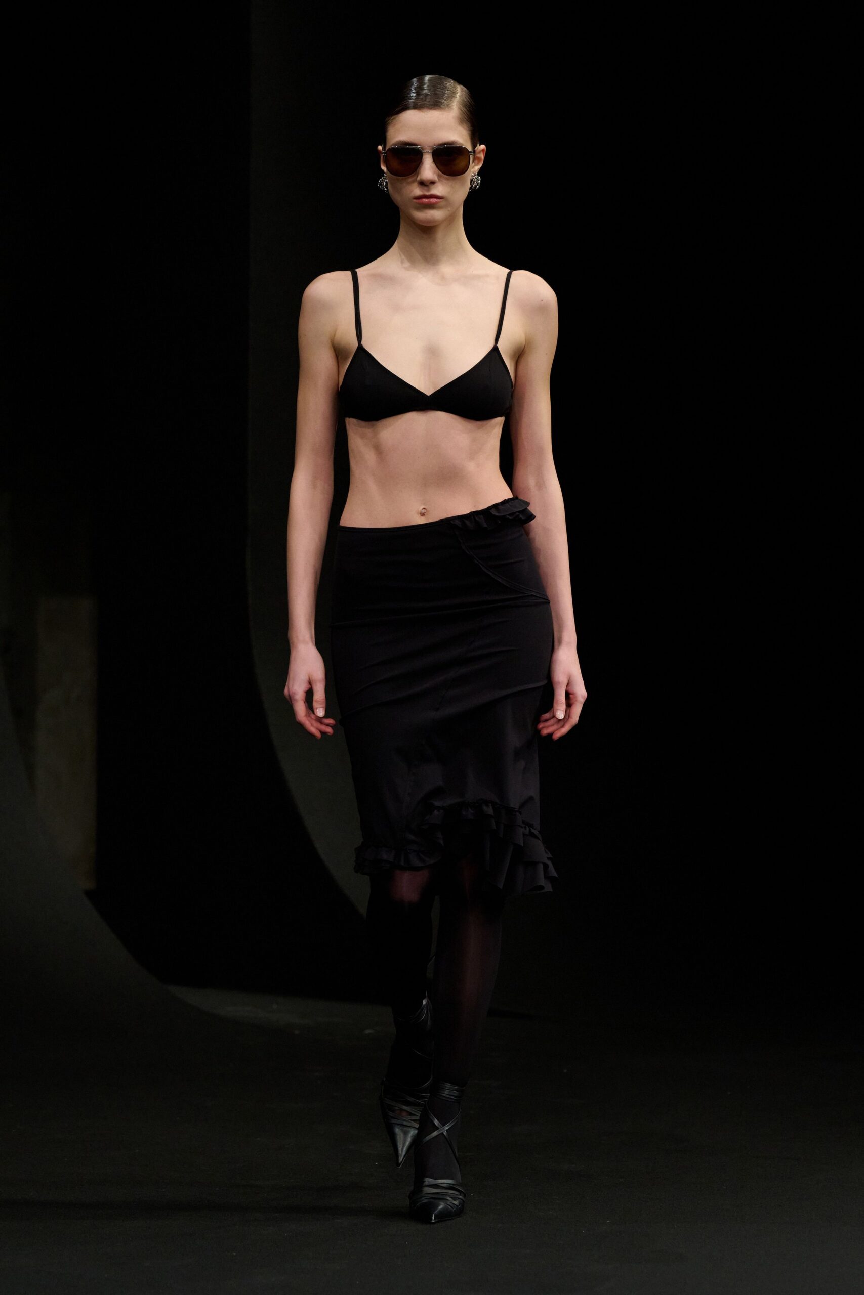 black fitted top and skirt