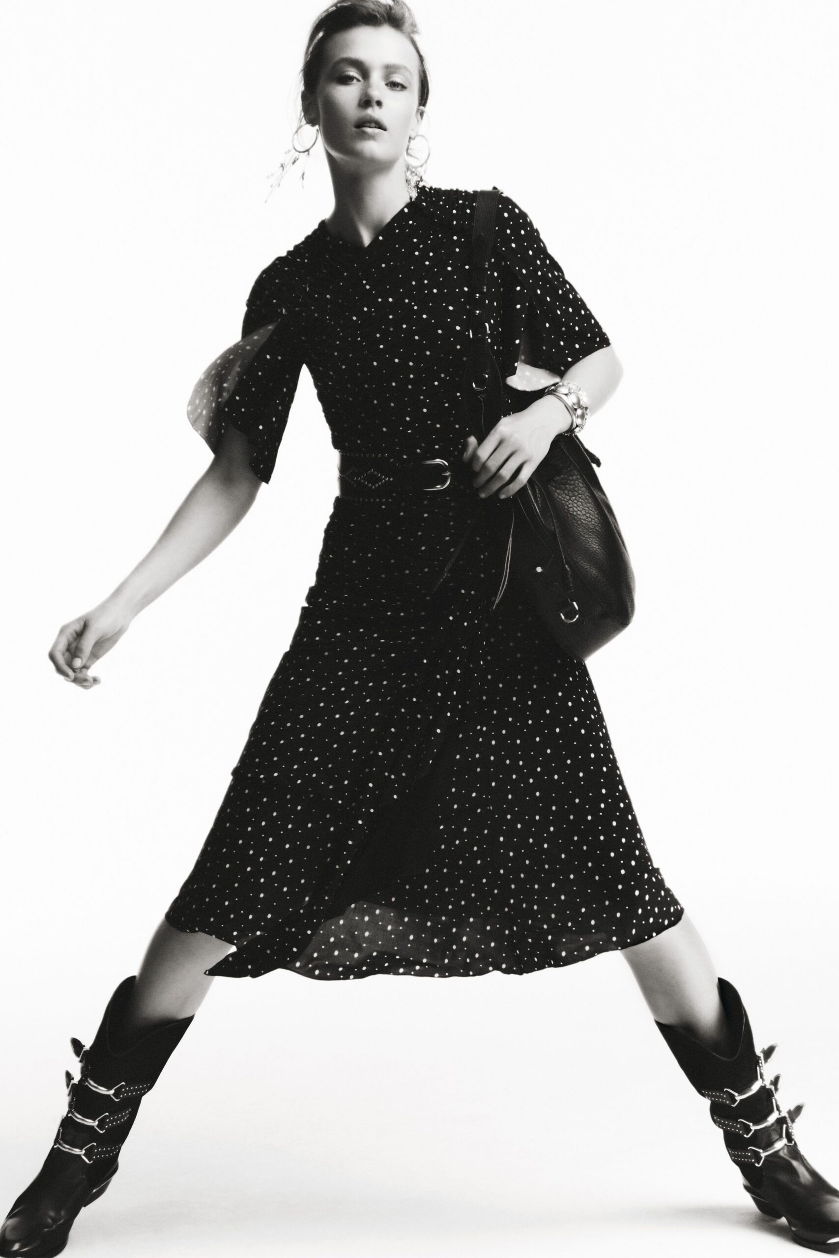 black polka-dot midi dress with boots