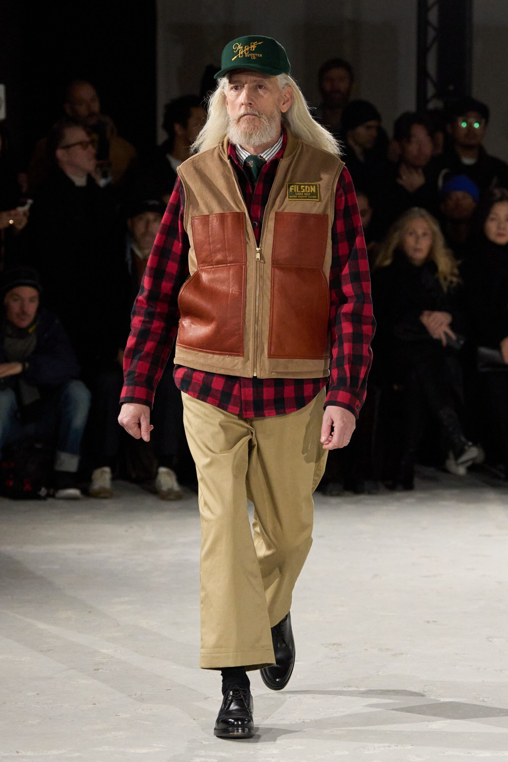 brown beige vest red black shirt