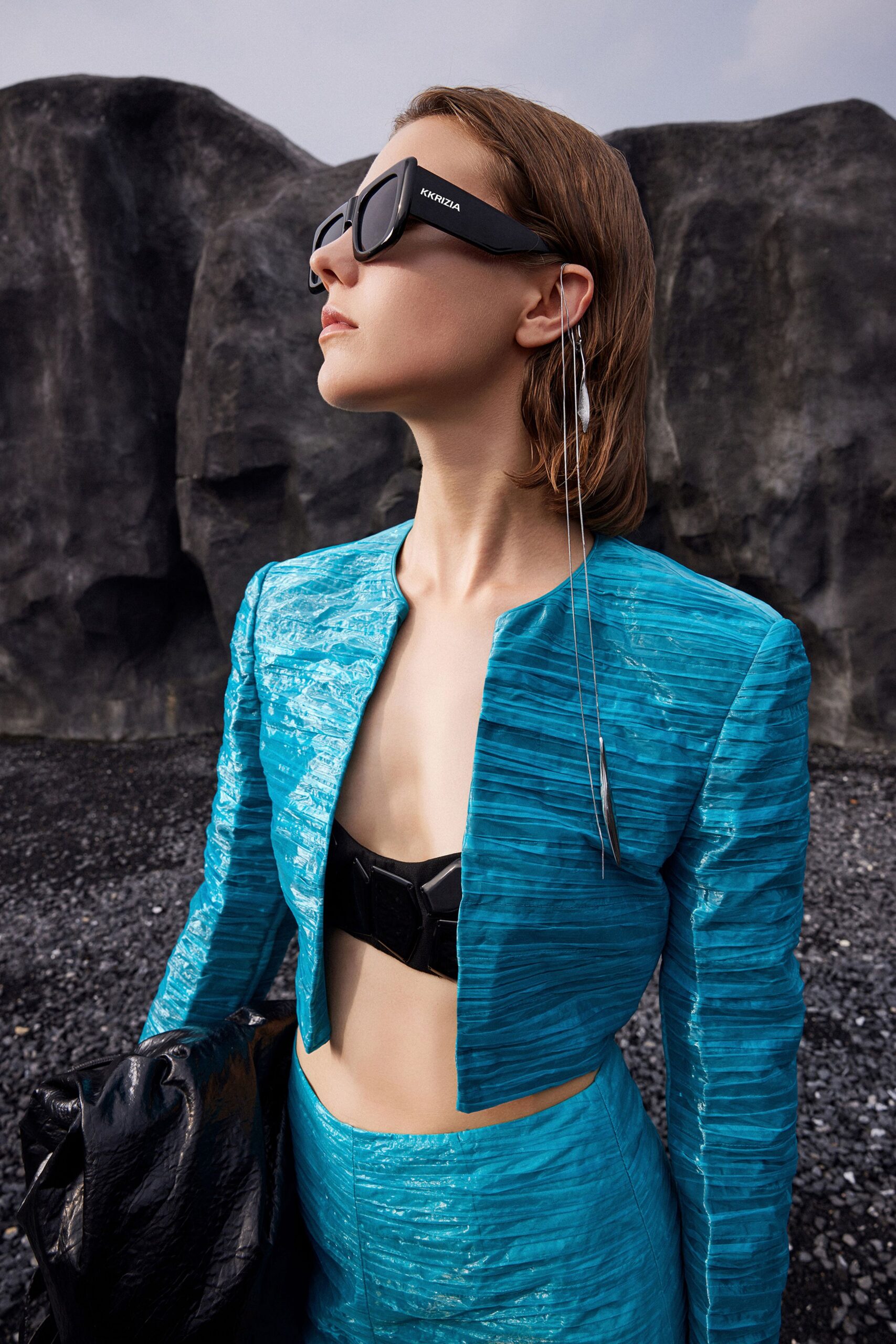 blue silk long-sleeve collared fitted pleated shiny jacket