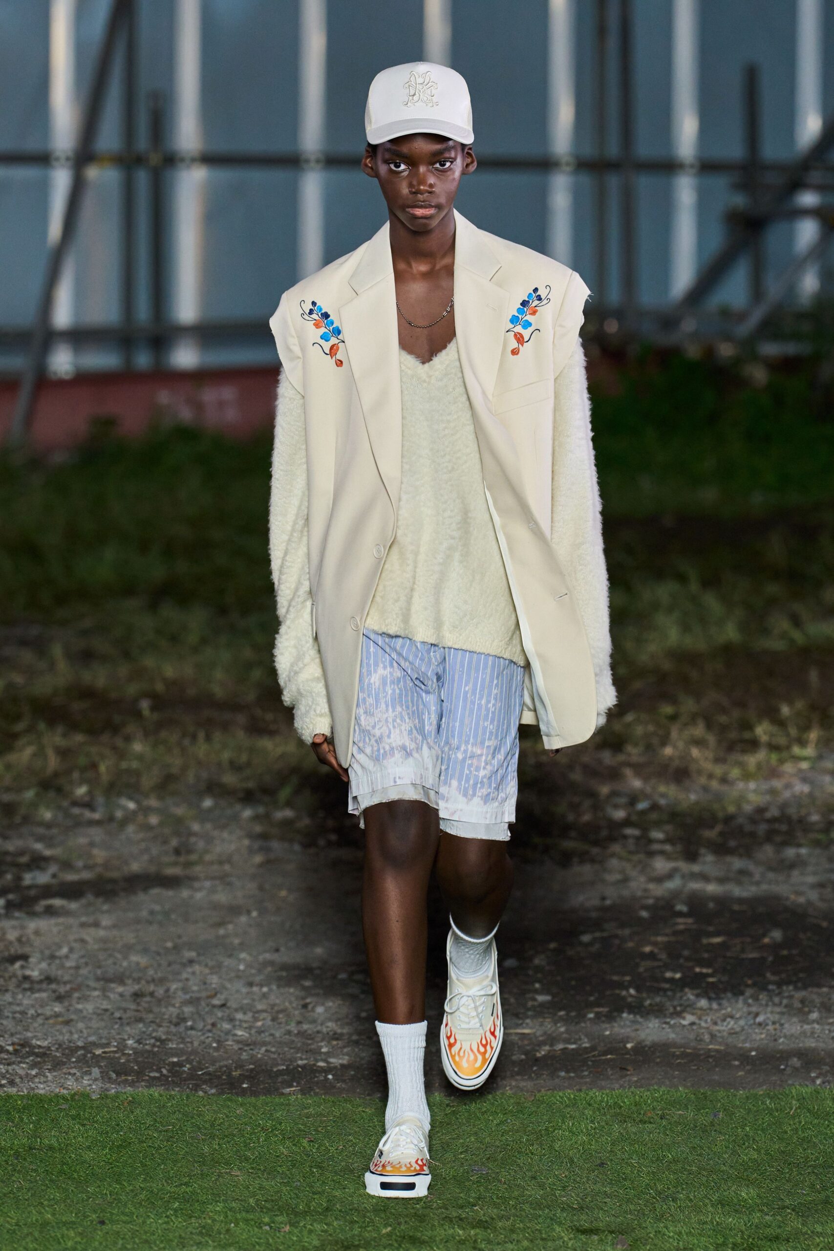 beige blazer with embroidered details