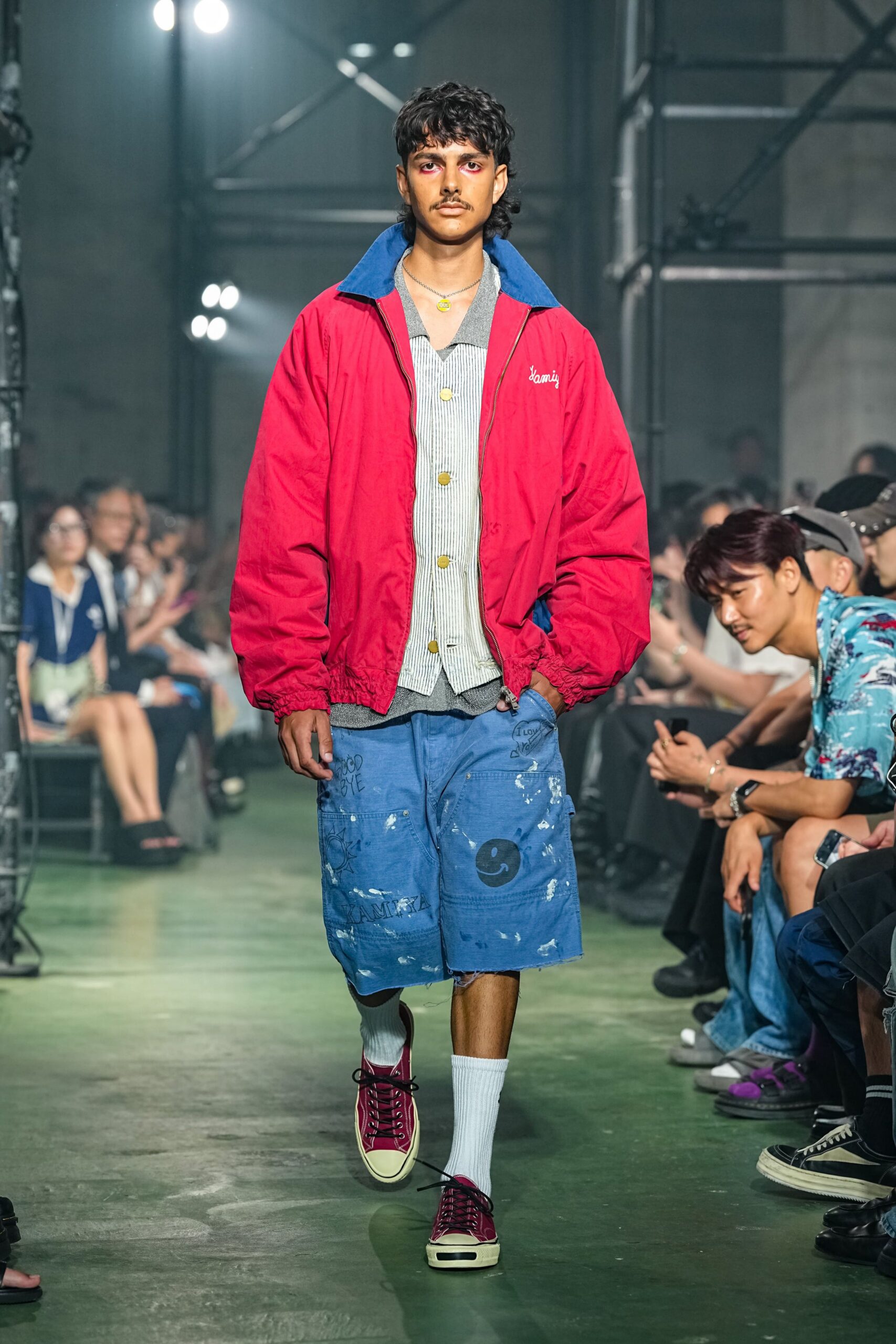 oversized red jacket with denim shorts