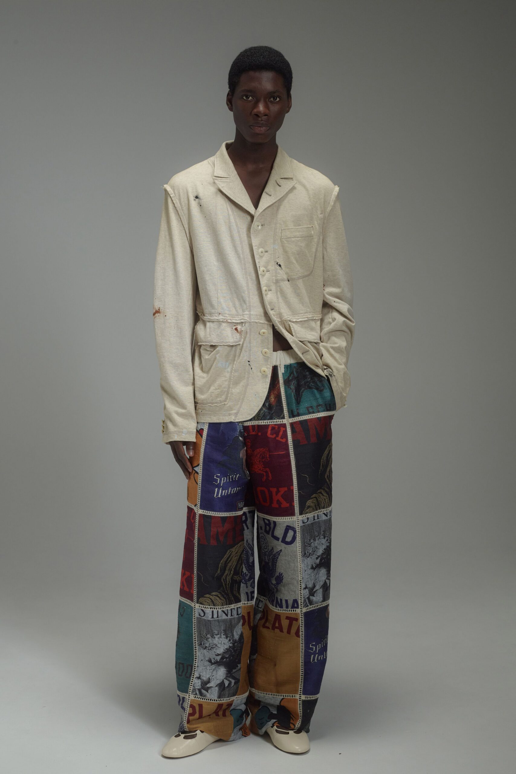 beige jacket multi pants