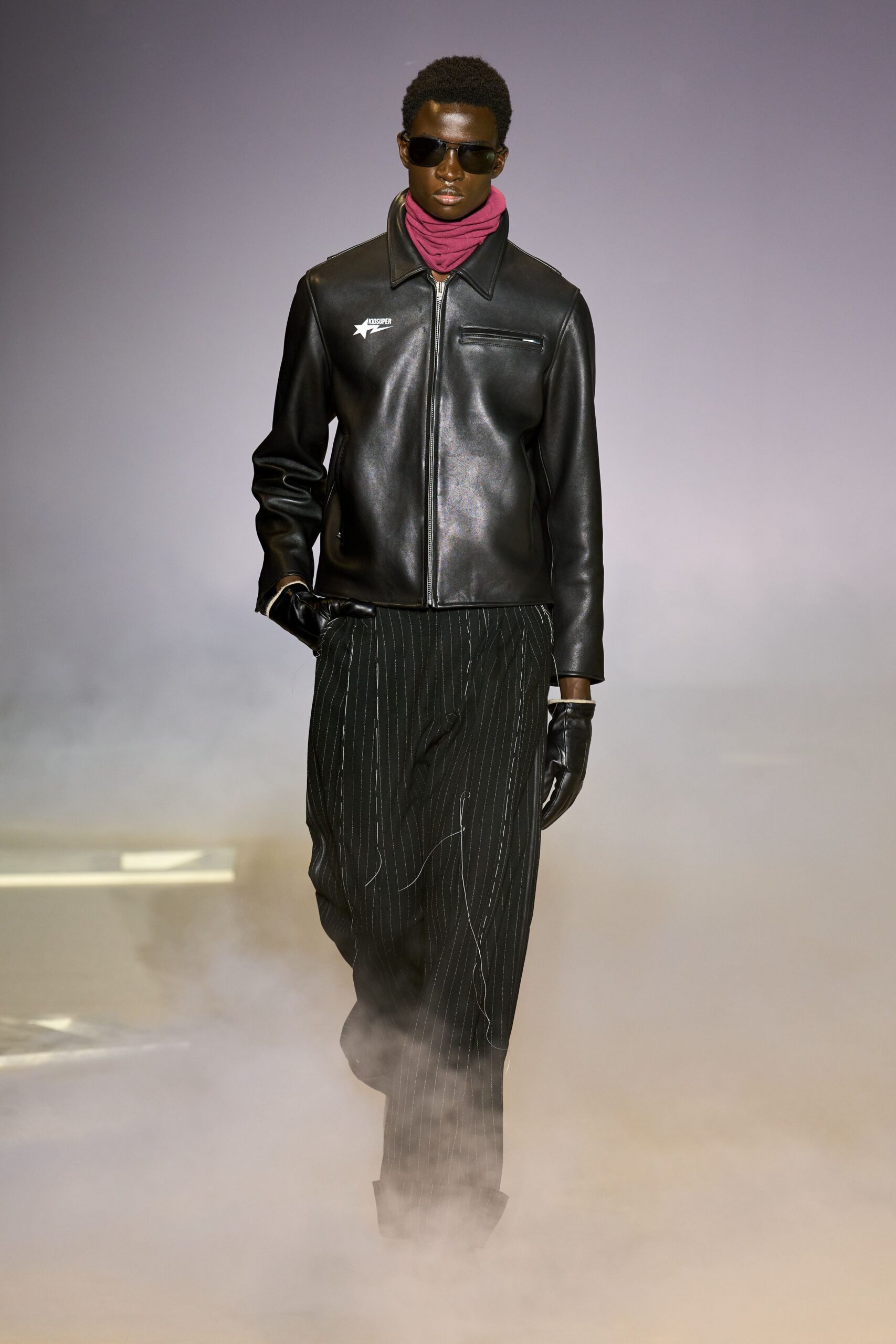 black leather jacket with striped pants