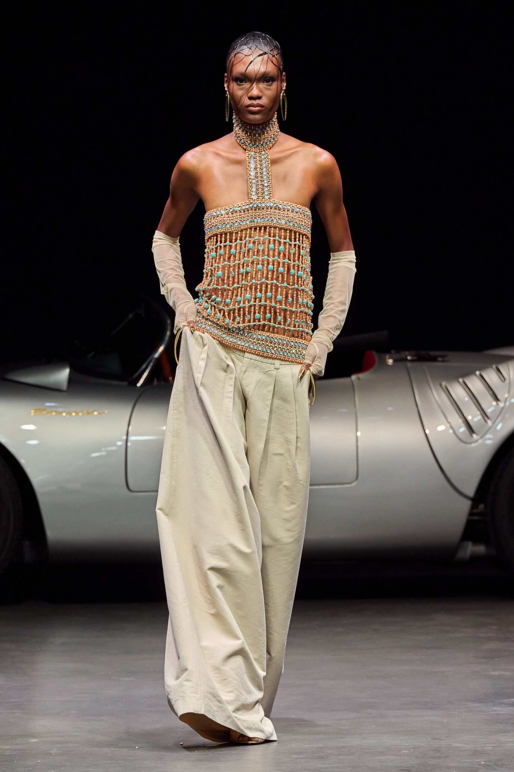 beige silk sleeveless high-neck fitted beaded top