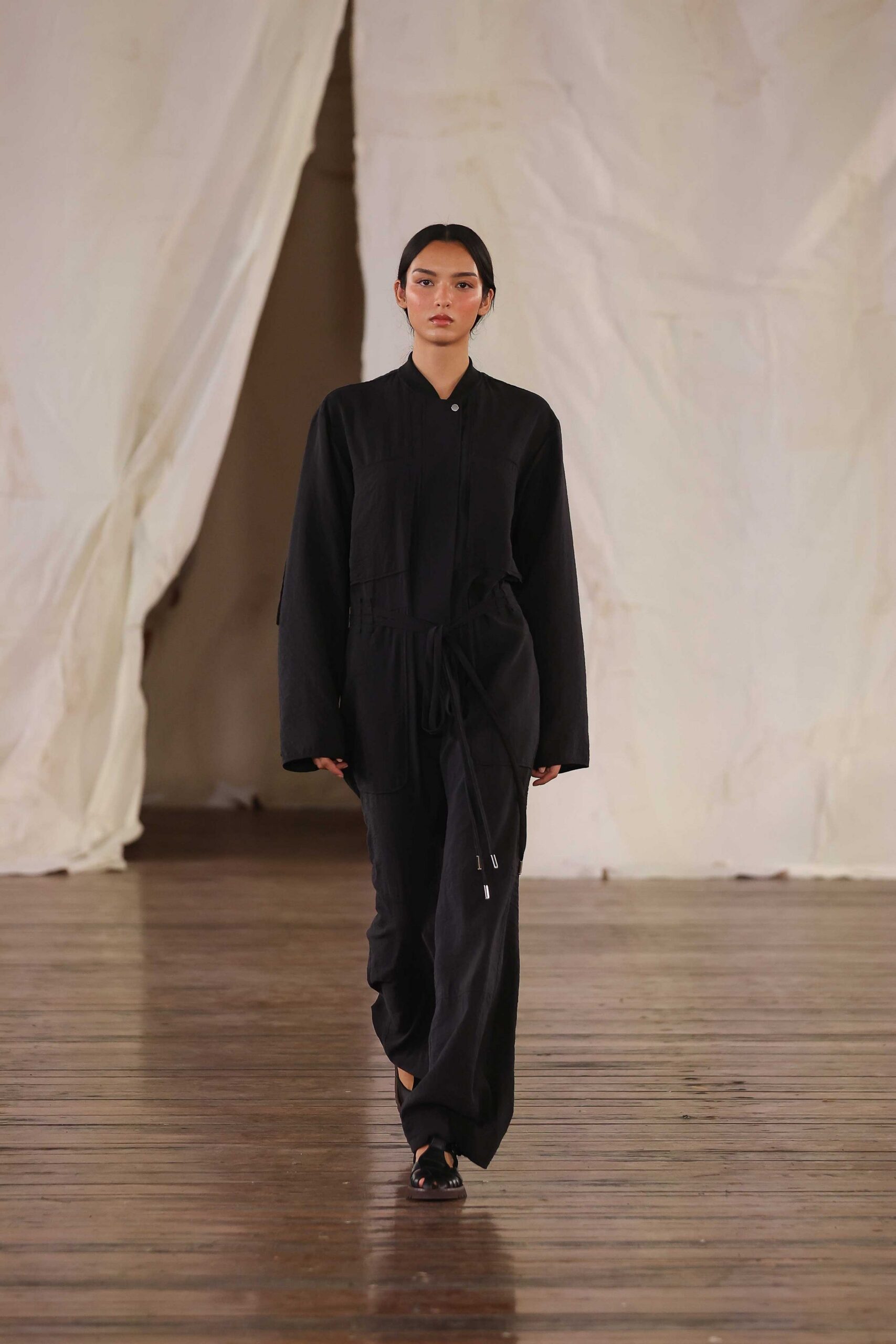 black relaxed jumpsuit with shoes