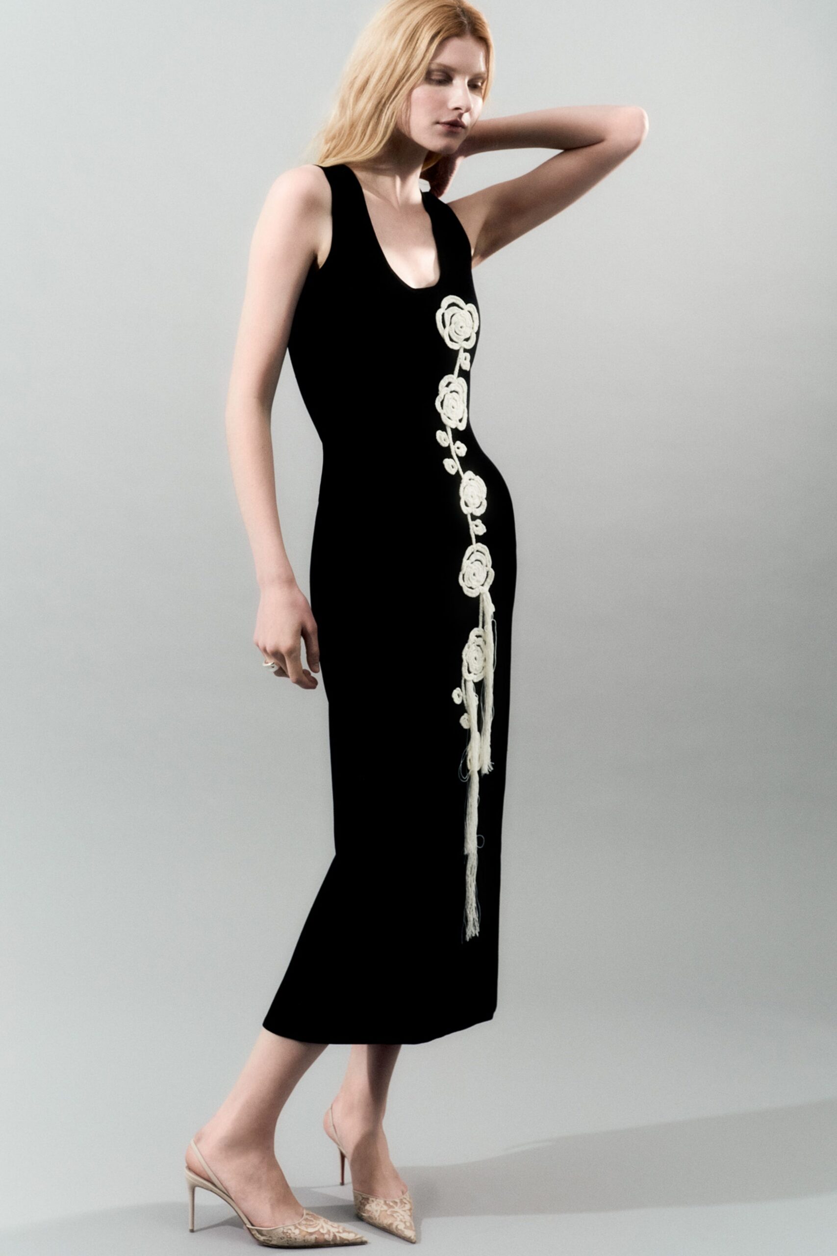 black fitted midi dress with embroidery