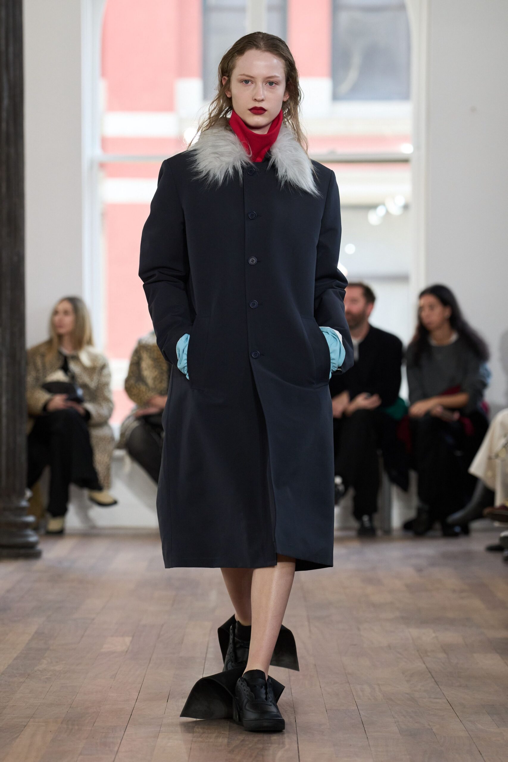 black wool long-sleeve collared fitted pockets zippered coat