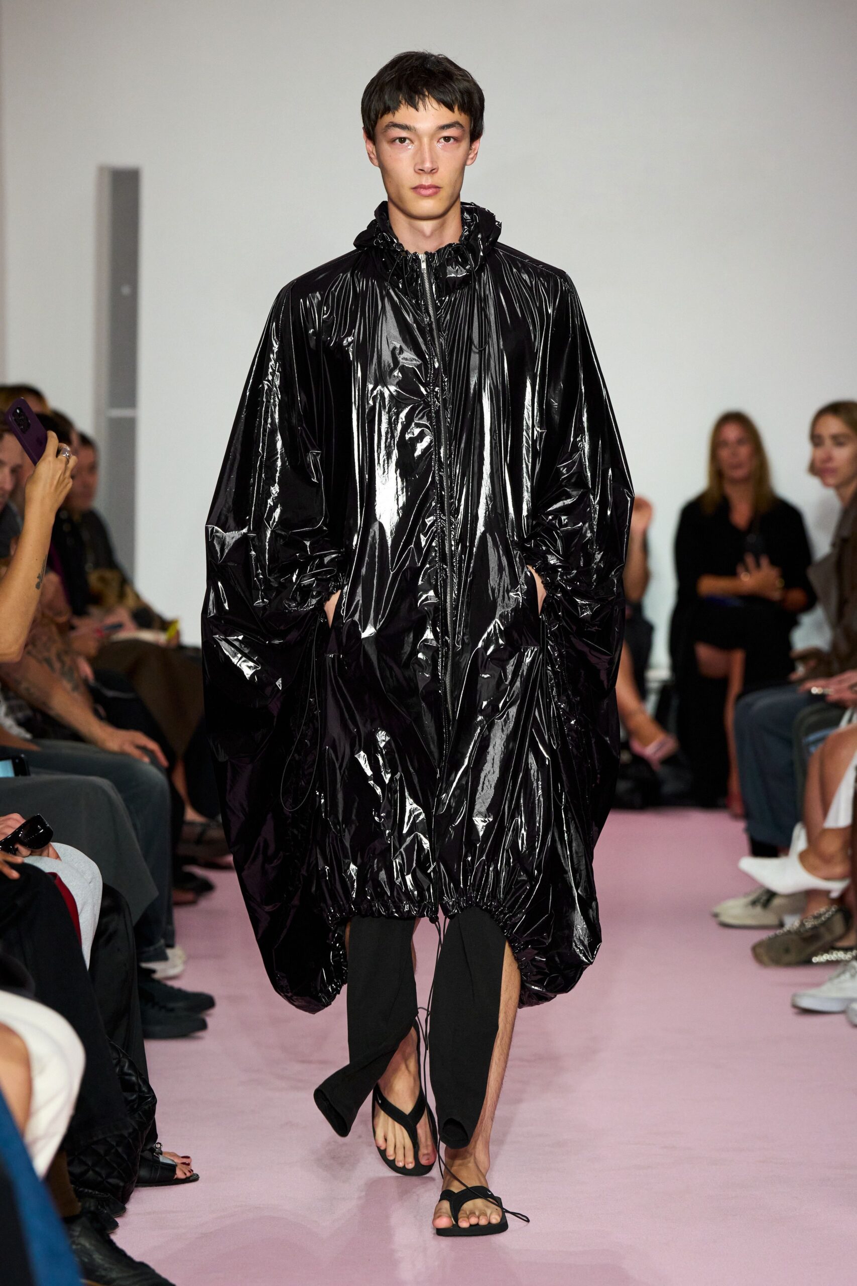 black vinyl long-sleeve hooded relaxed zippered shiny coat