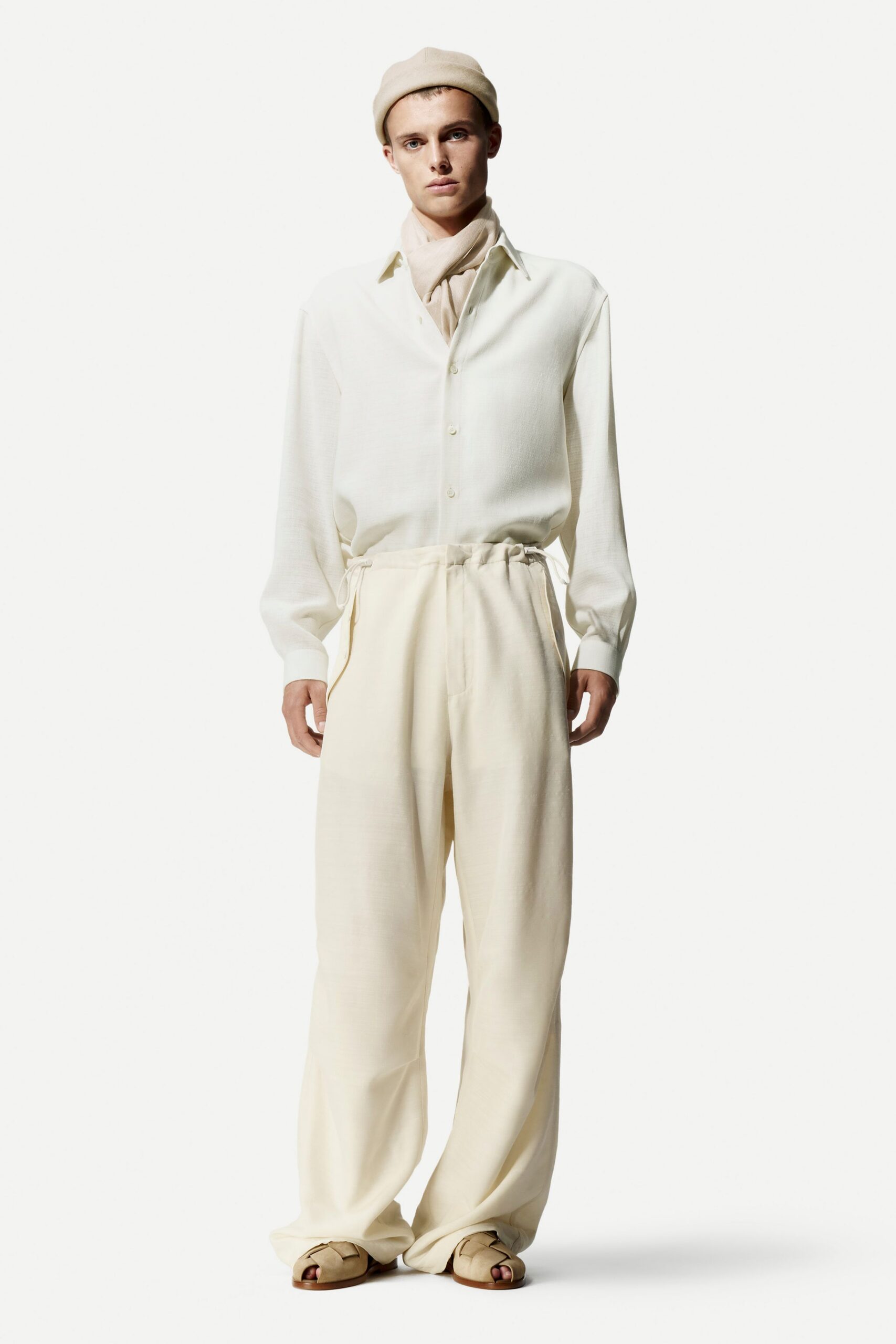 white shirt beige pants outfit