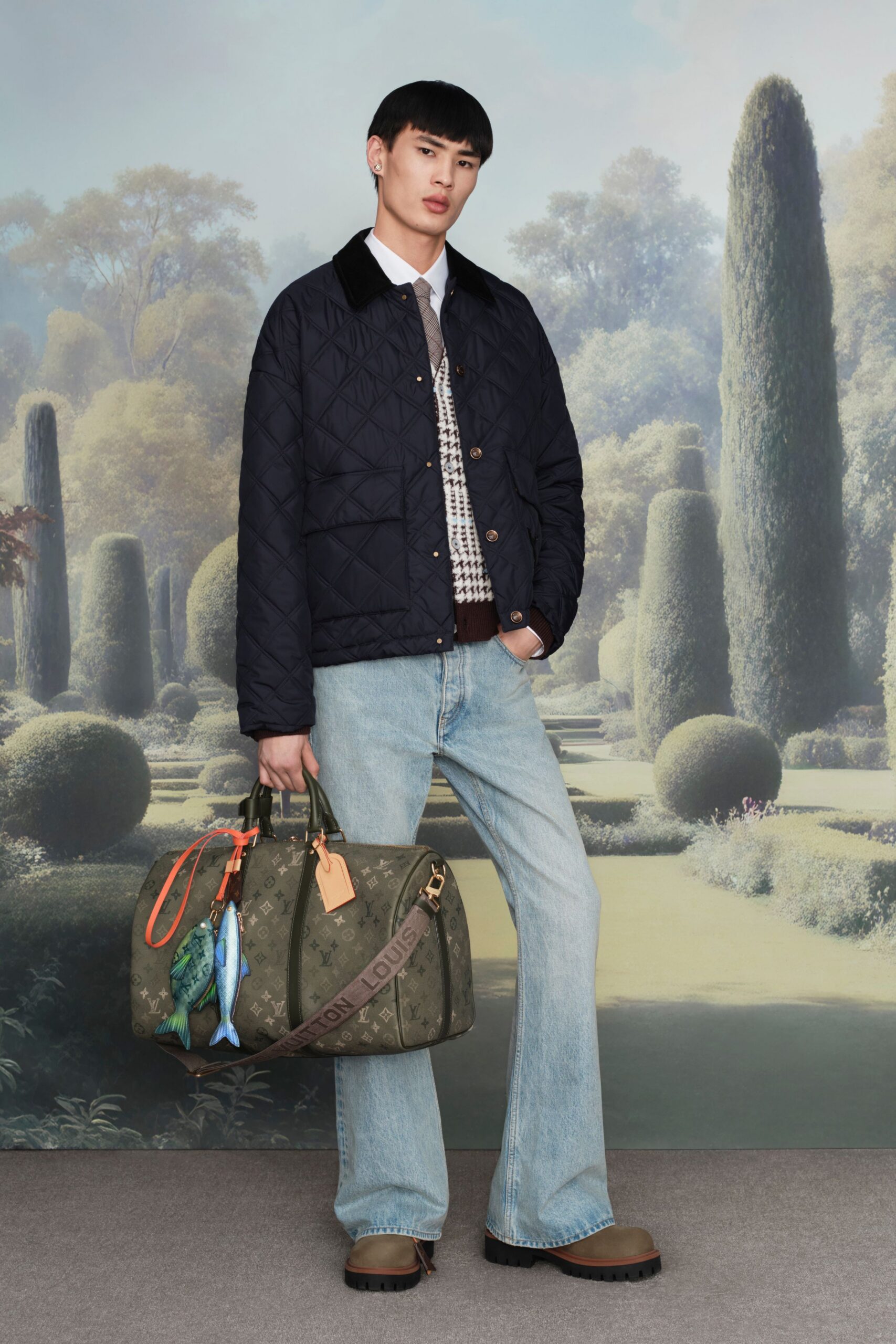 black quilted jacket with blue jeans