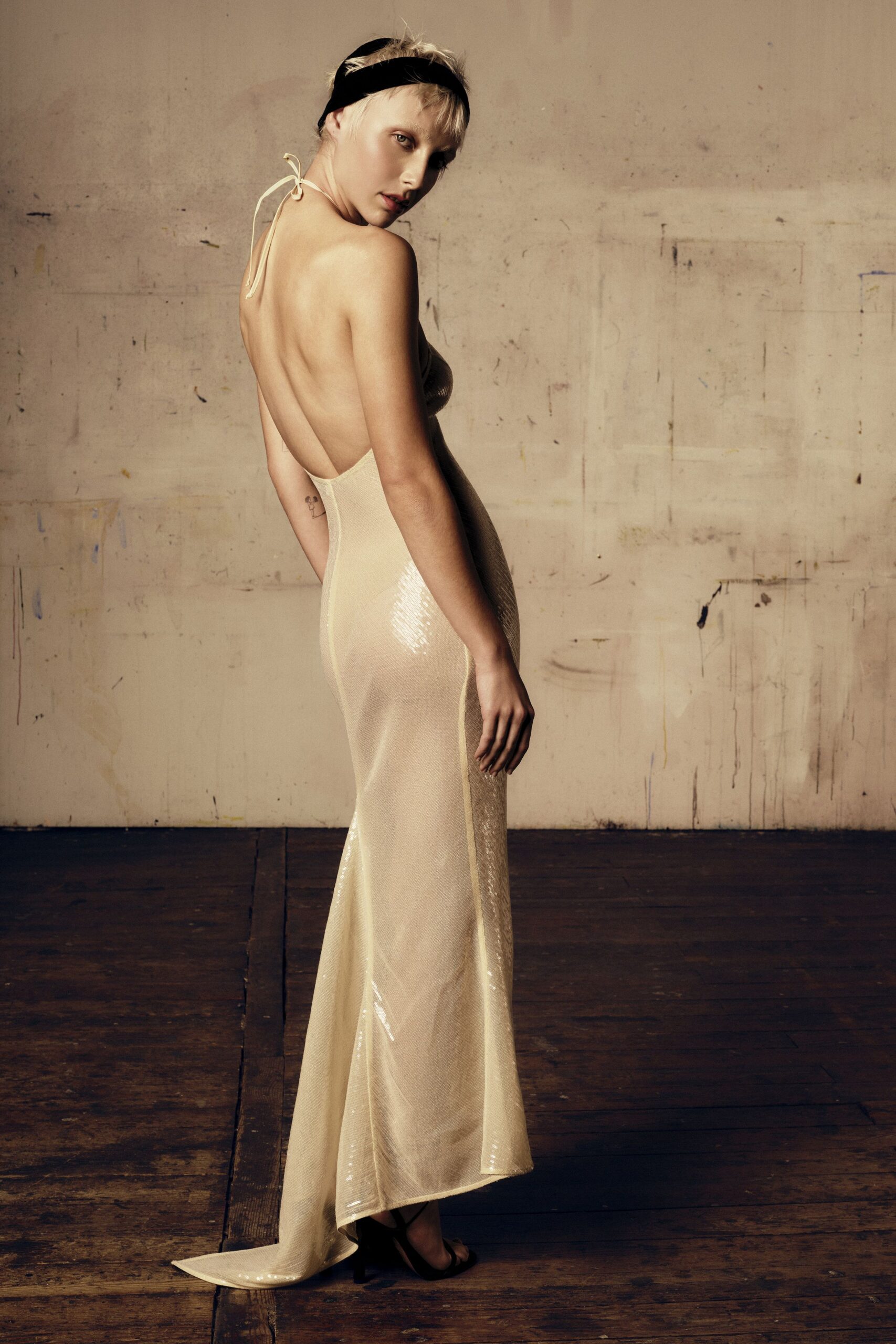 beige silk sleeveless backless fitted sequined shiny gown