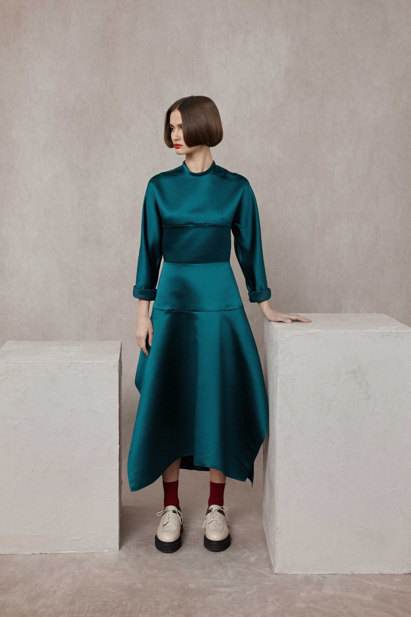 teal satin long-sleeve high-neck fitted draped shiny dress