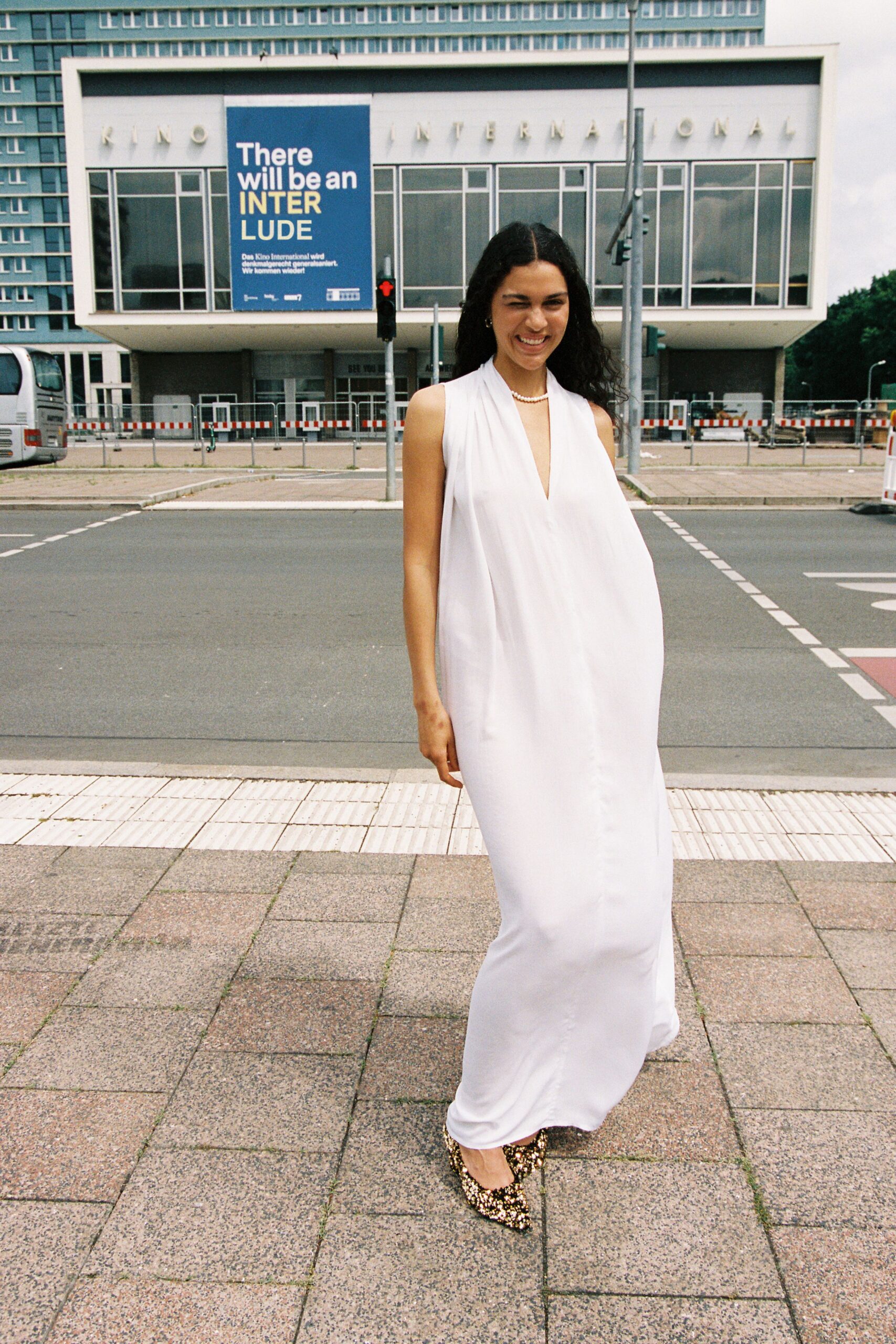 white relaxed maxi dress with animal-print shoes