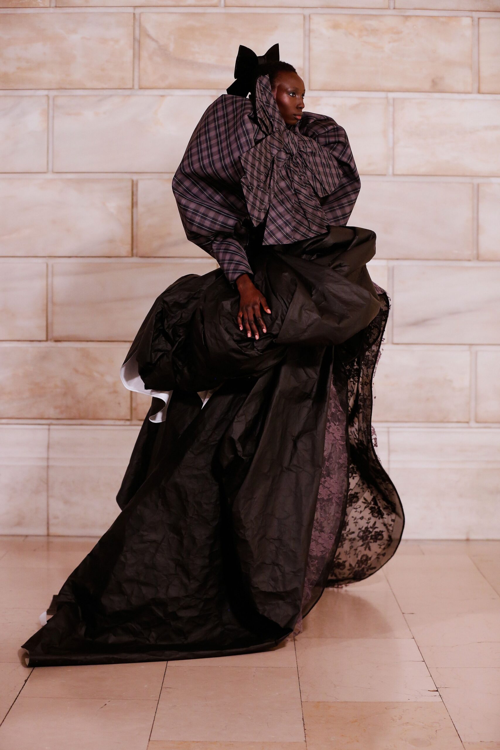 black and purple pleated gown