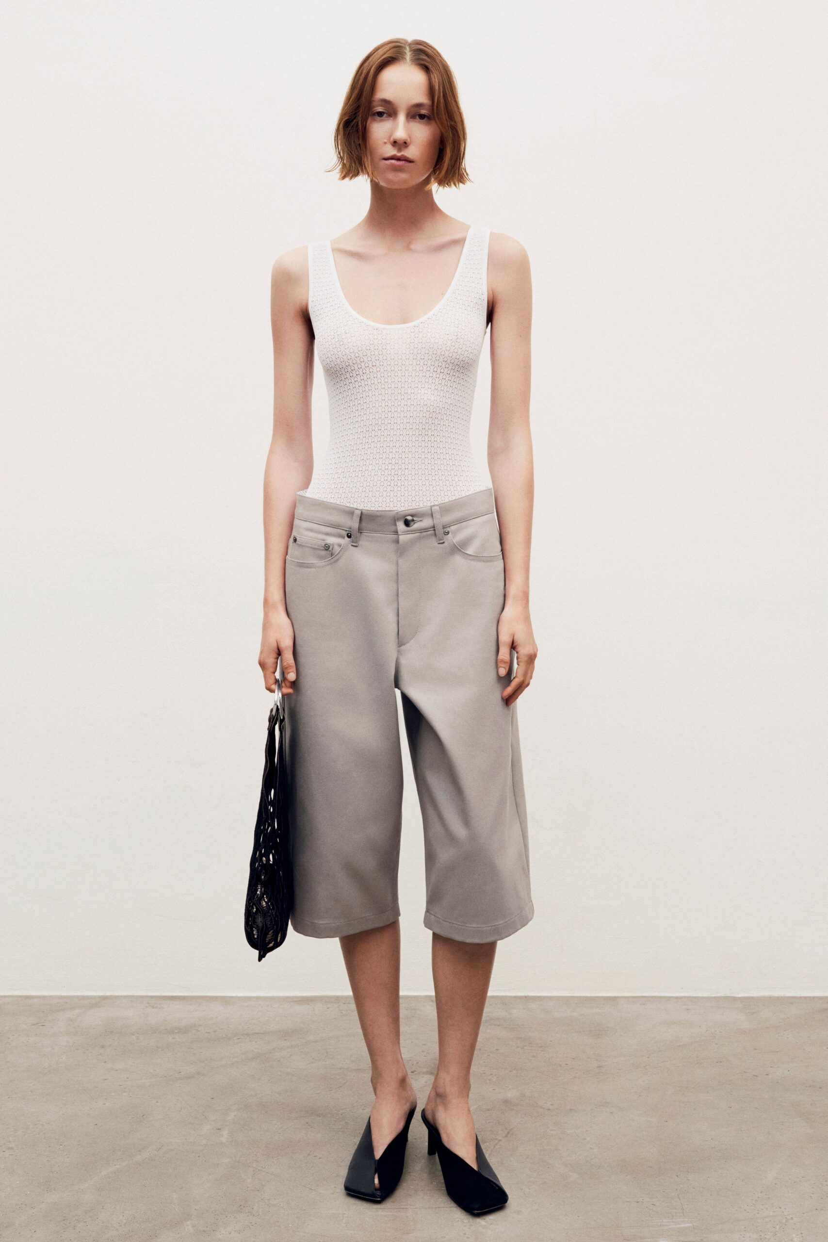 white cotton sleeveless scoop-neck fitted textured bodysuit