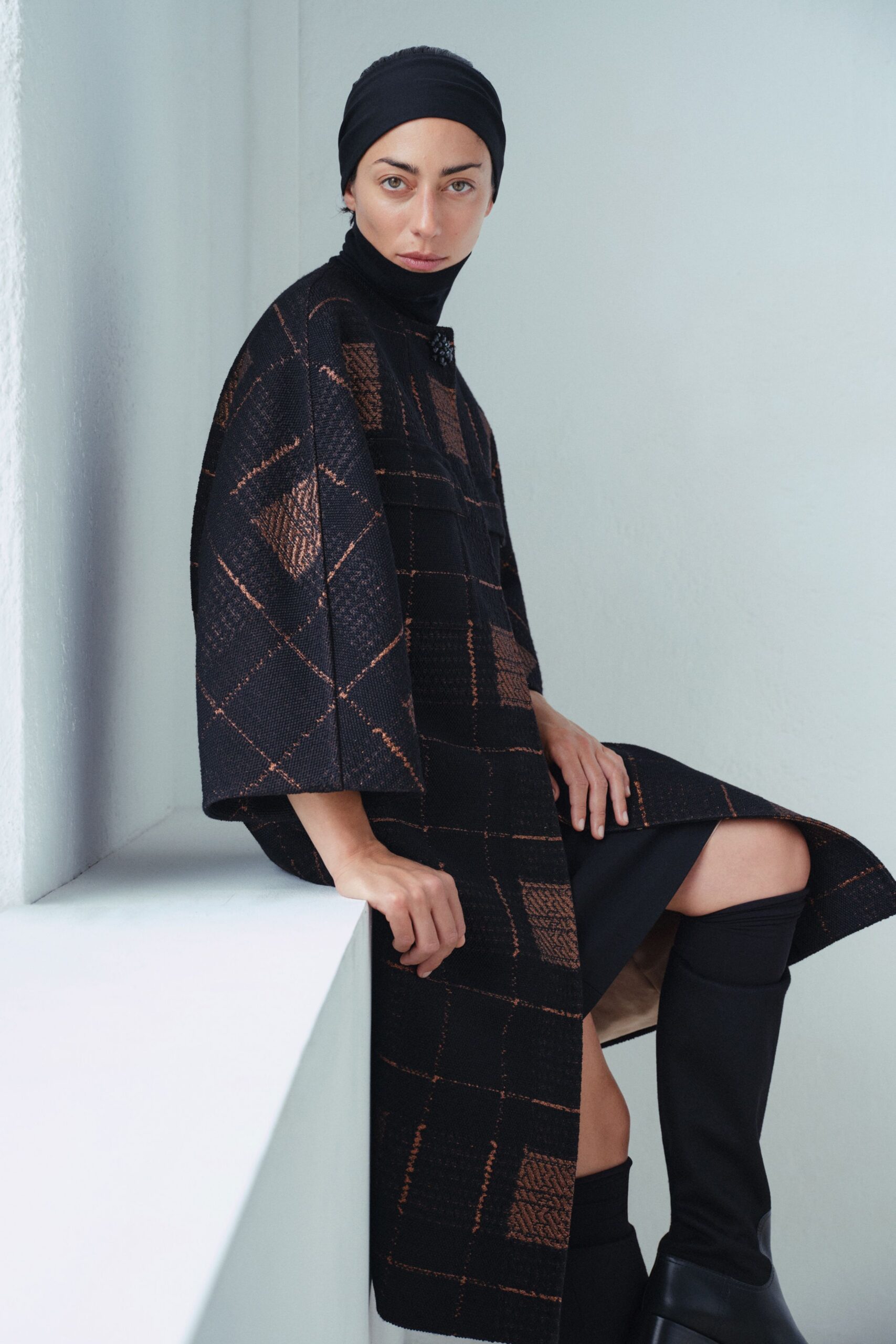 black wool coat with checked pattern