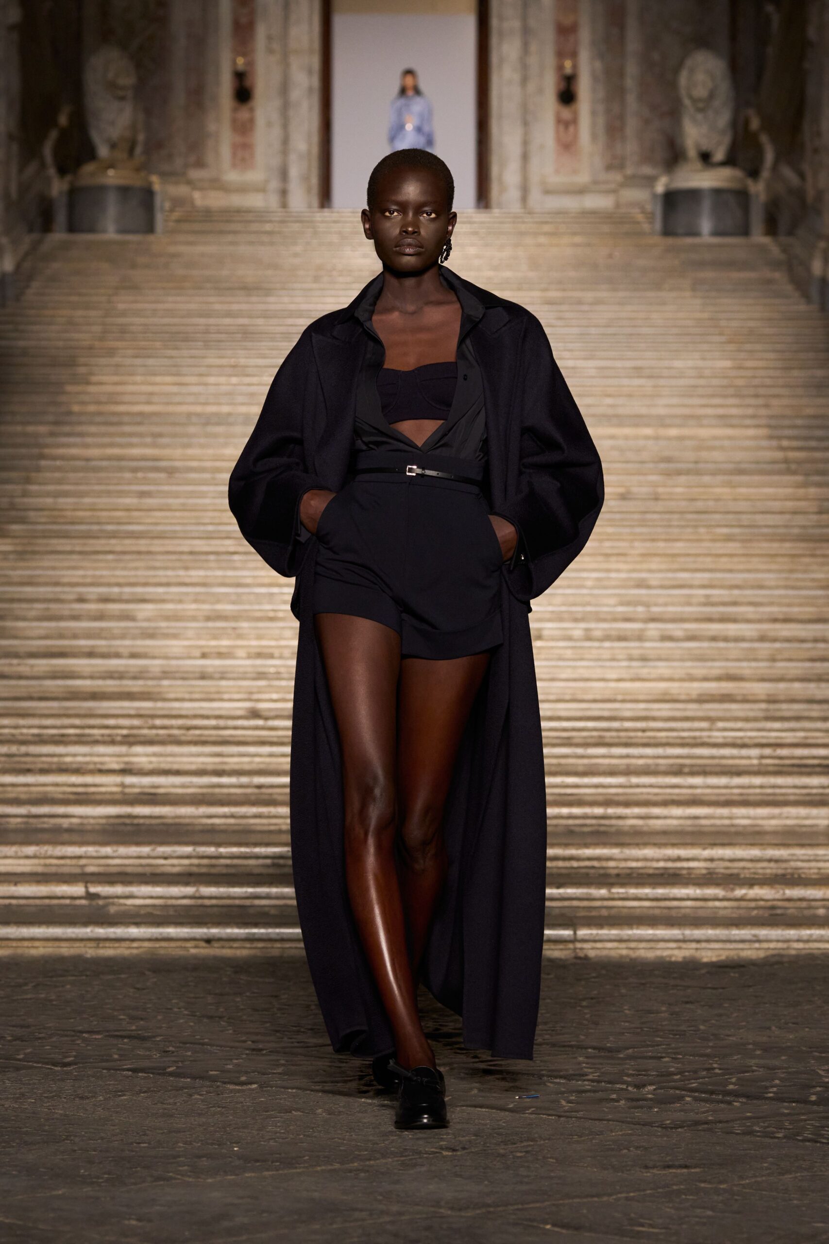 black coat with fitted top and shorts