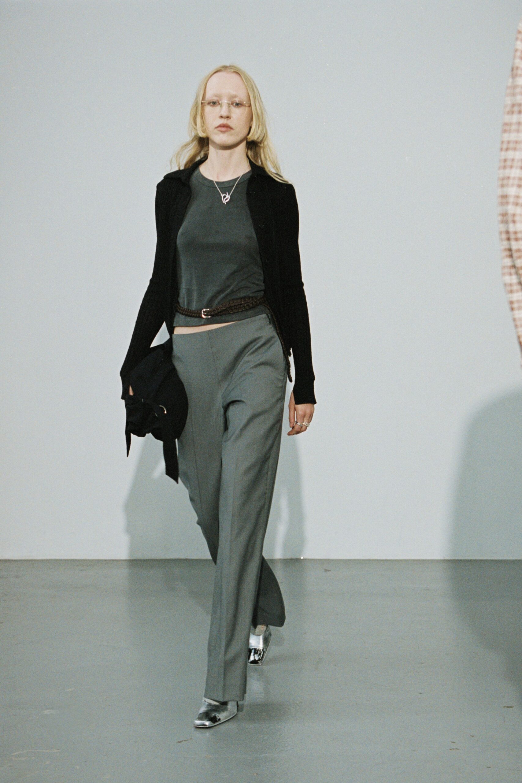gray fitted top with black cardigan