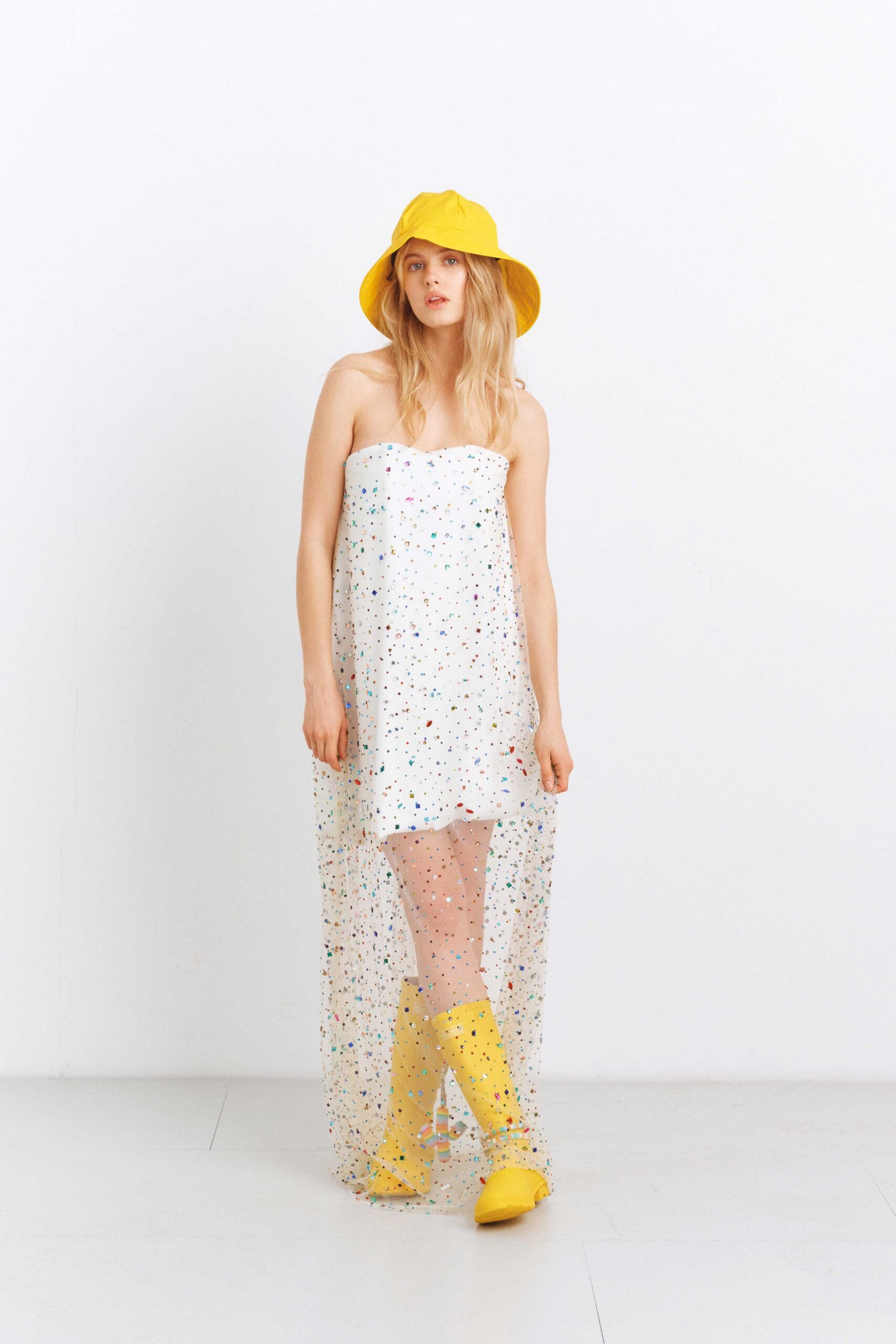 white multi-layered maxi dress with yellow accessories