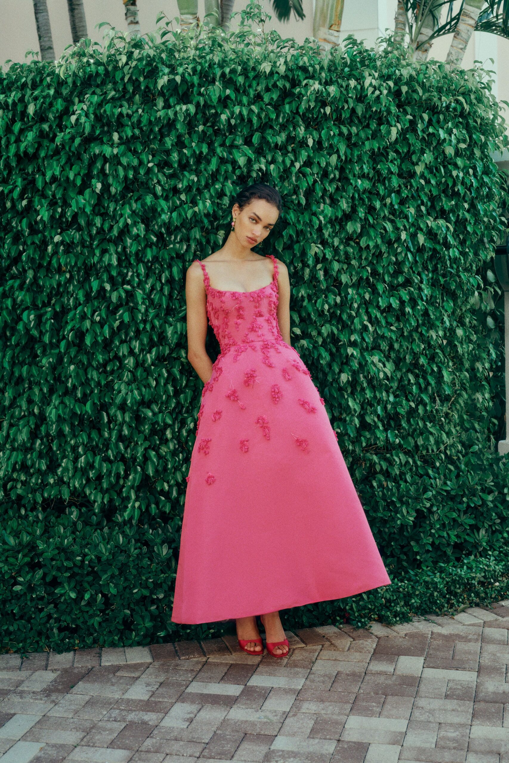 pink silk sleeveless v-neck fitted embroidered a-line gown