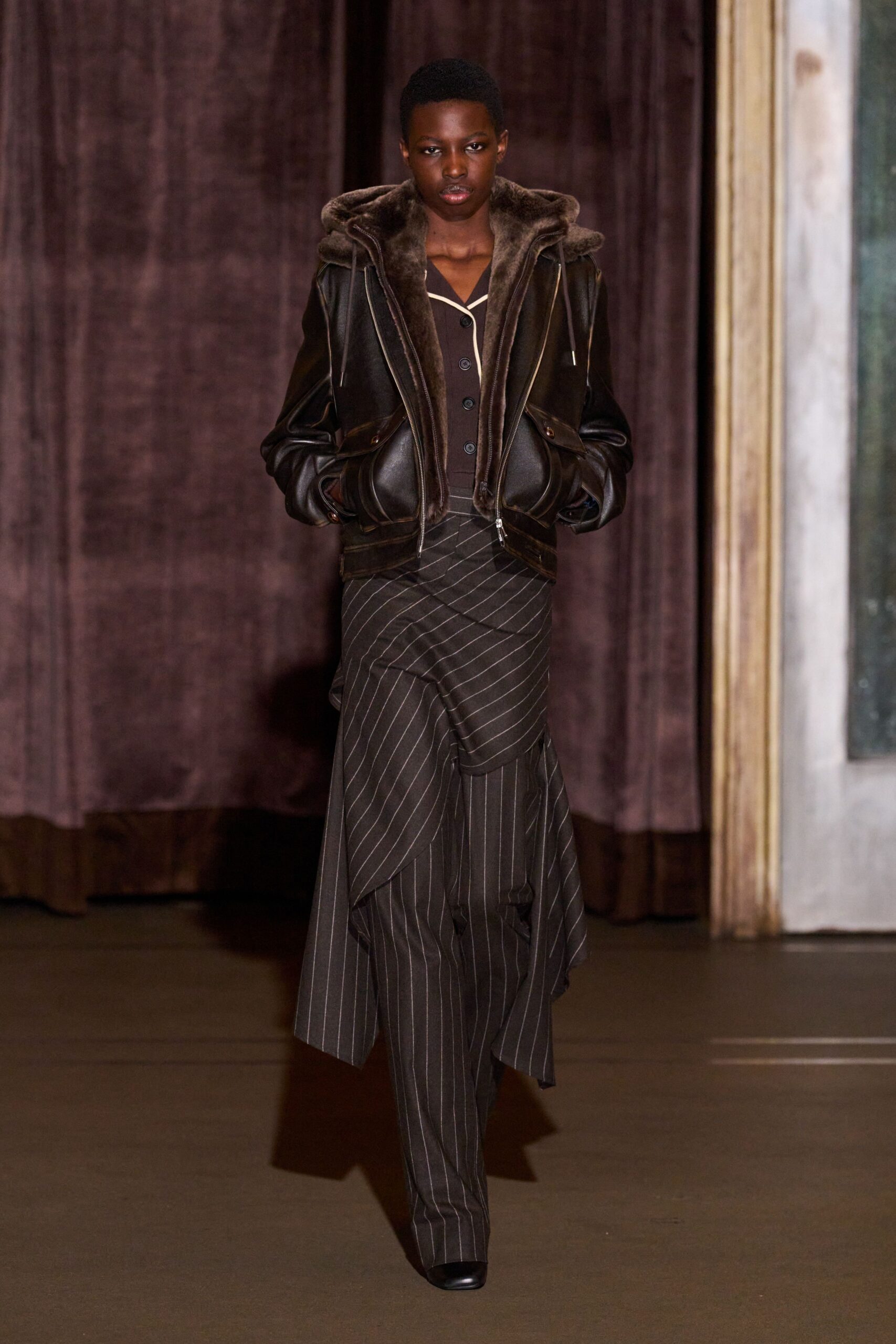 black leather jacket with asymmetric skirt