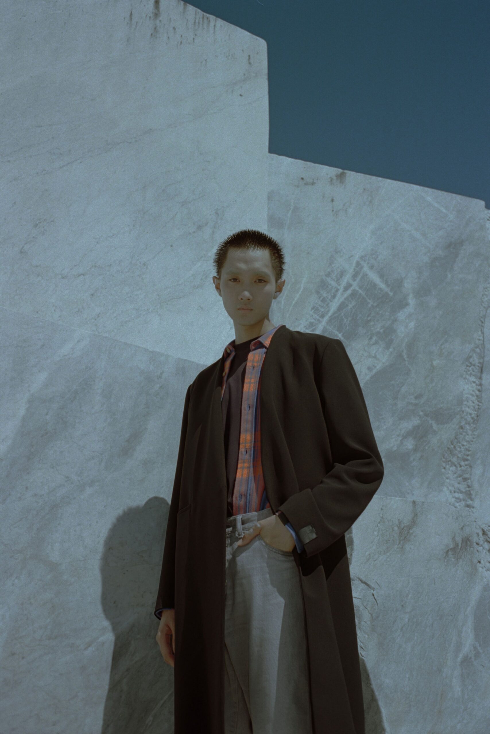 black coat with checked shirt