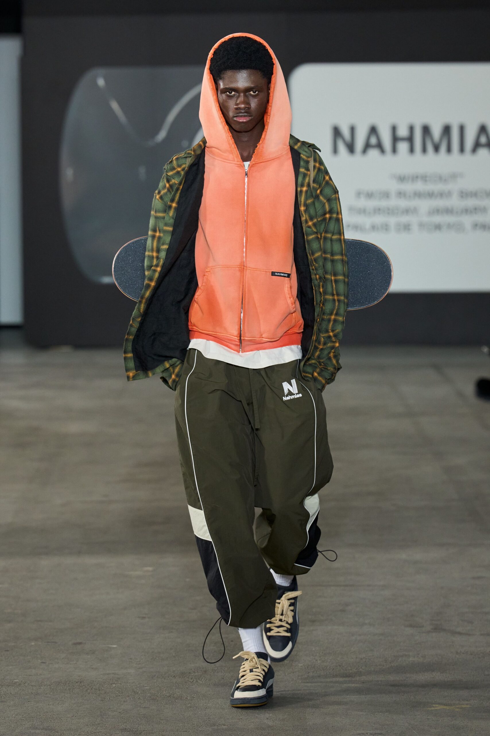 orange hoodie green jacket olive pants