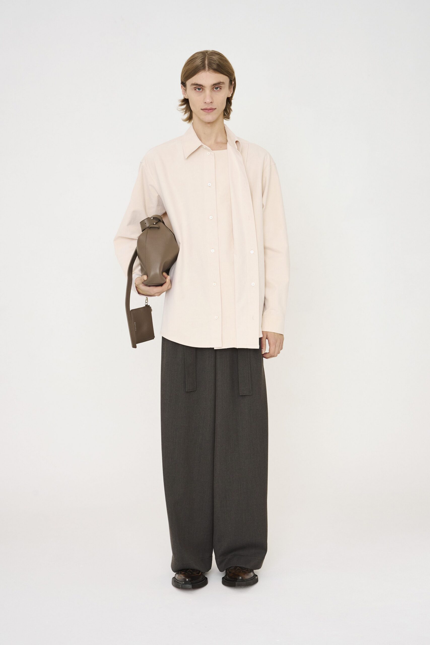 pink relaxed shirt gray wide-leg pants