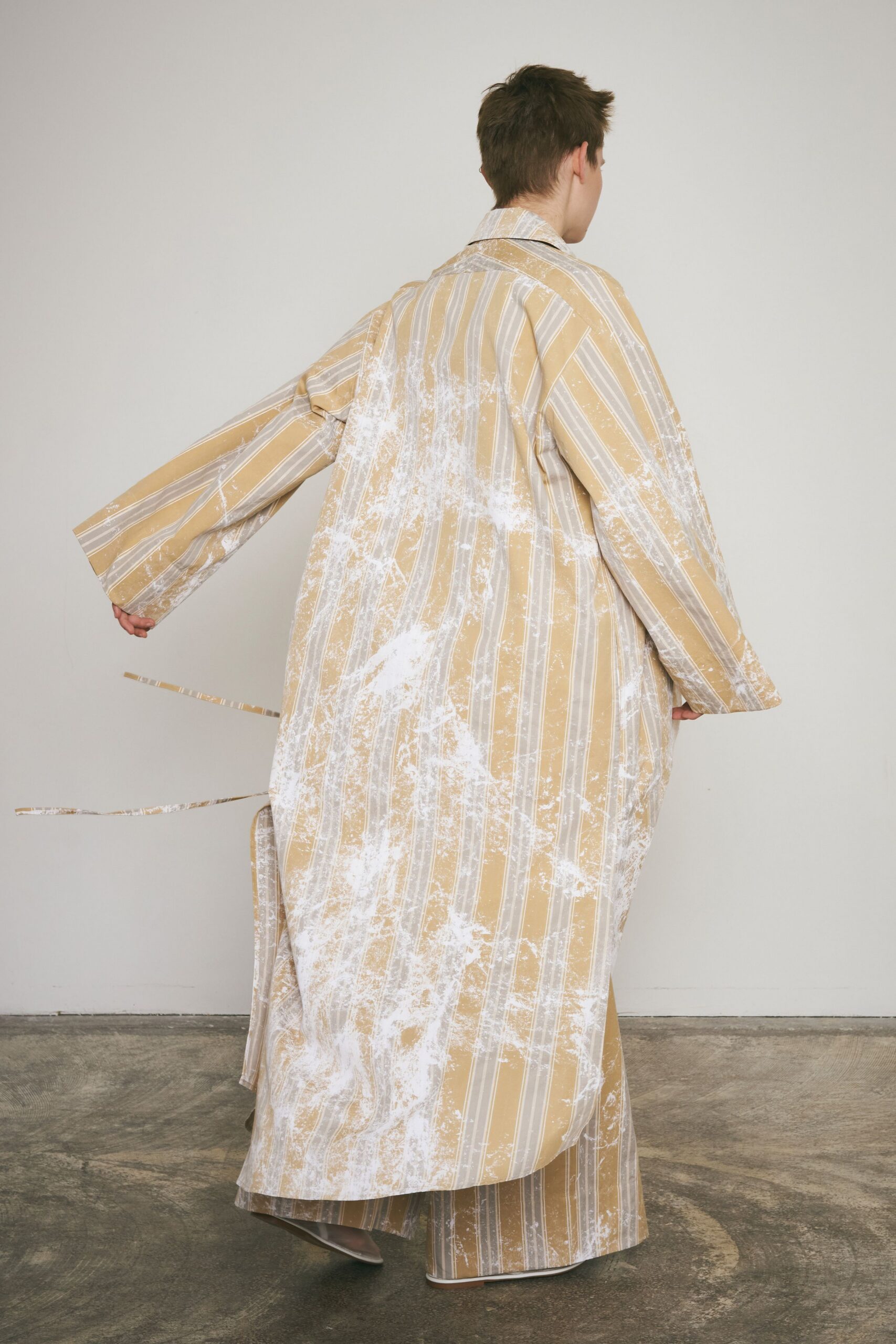 yellow and white striped coat