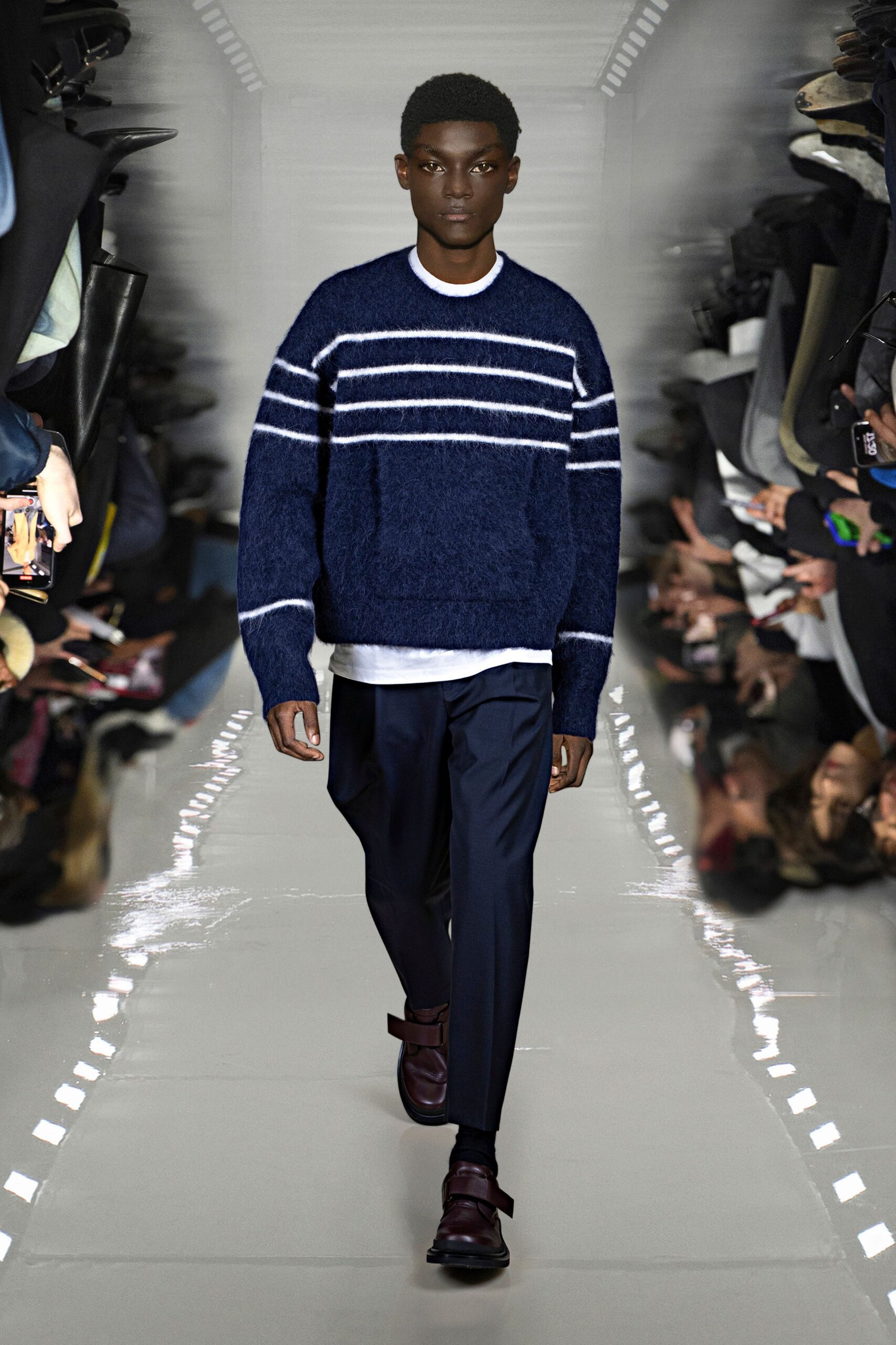 navy striped sweater with black pants