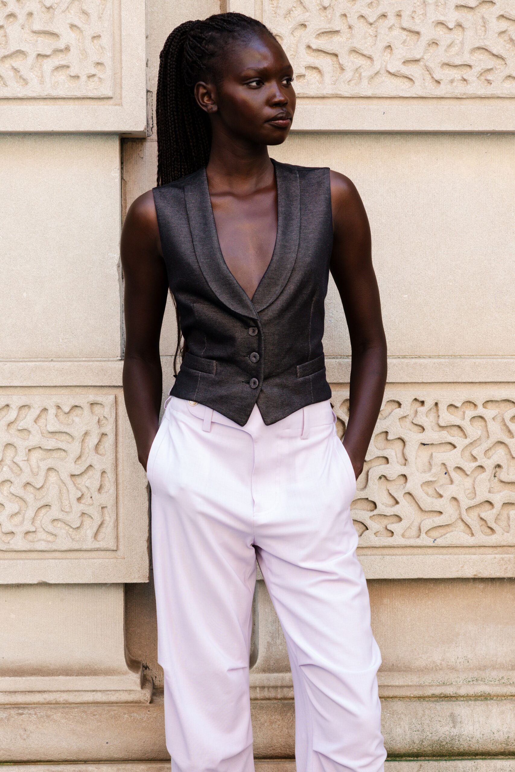 black fitted vest with pink pants
