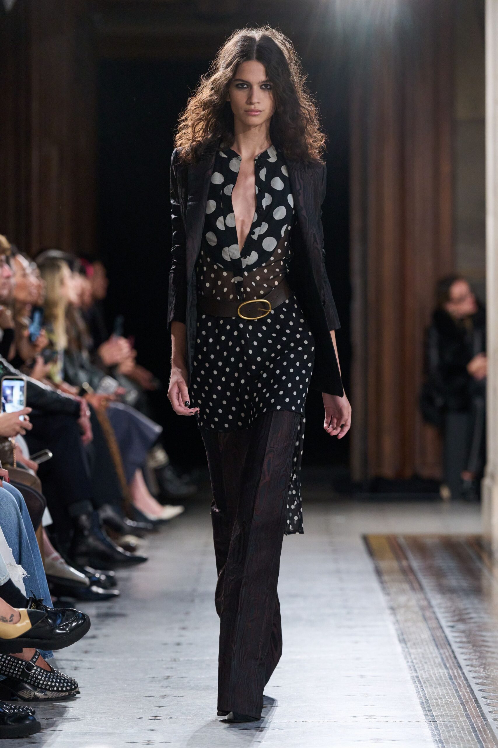 black tailored blazer with polka-dot shirt