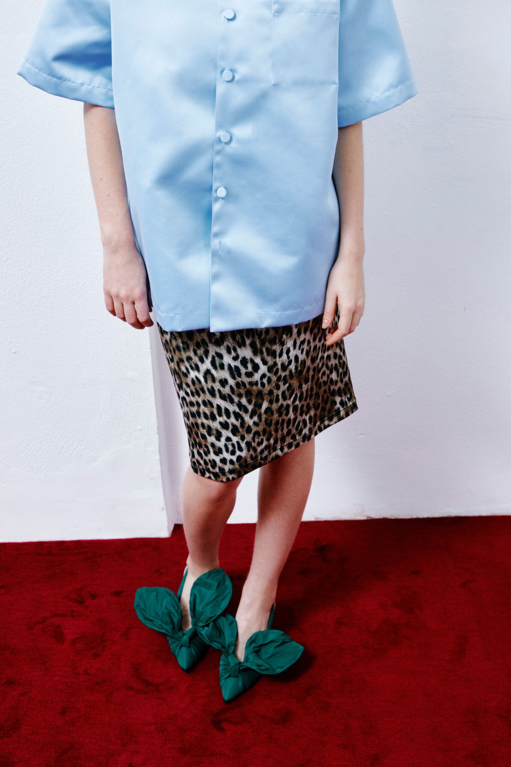 blue silk shirt with animal-print skirt