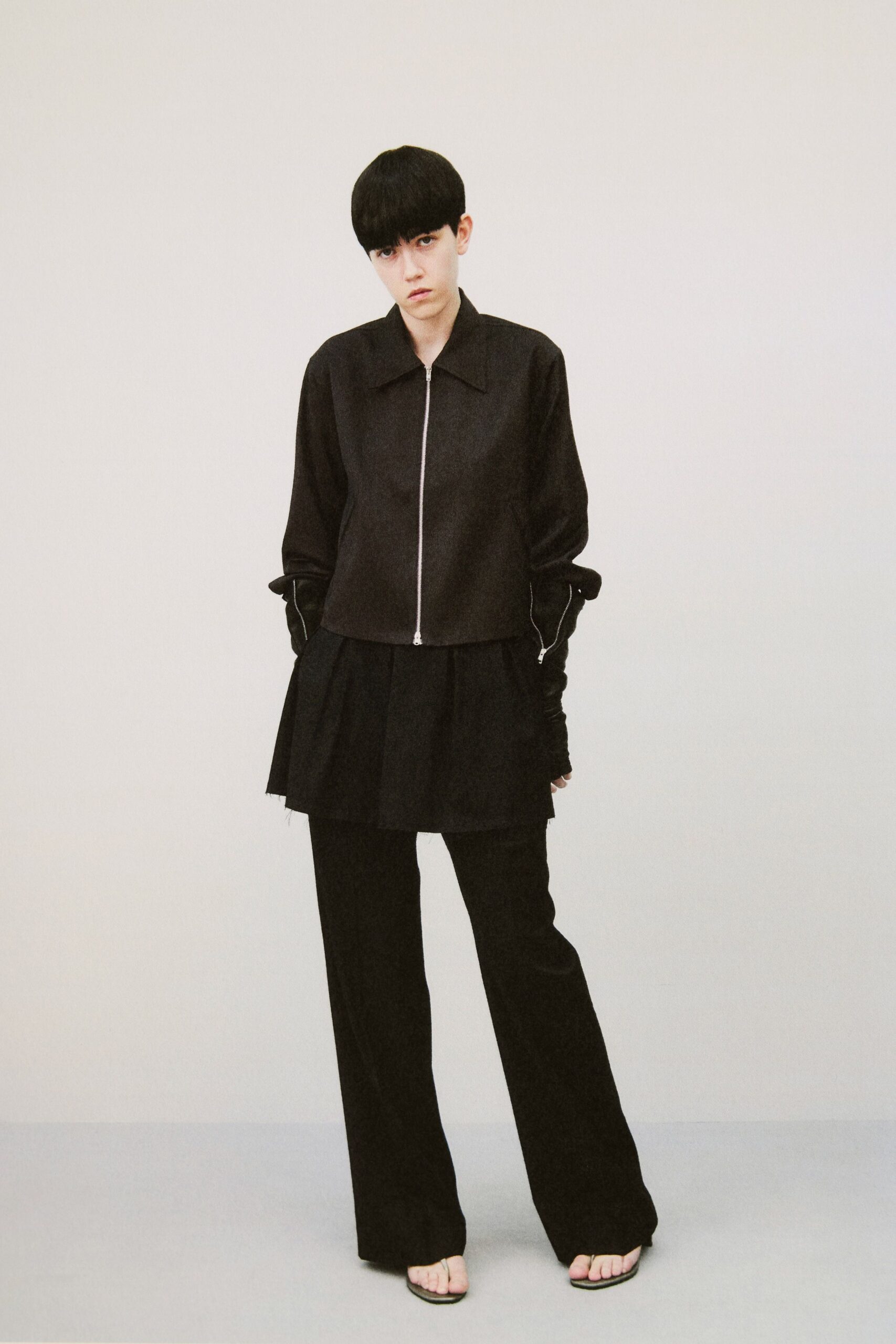 black relaxed jacket with layered skirt
