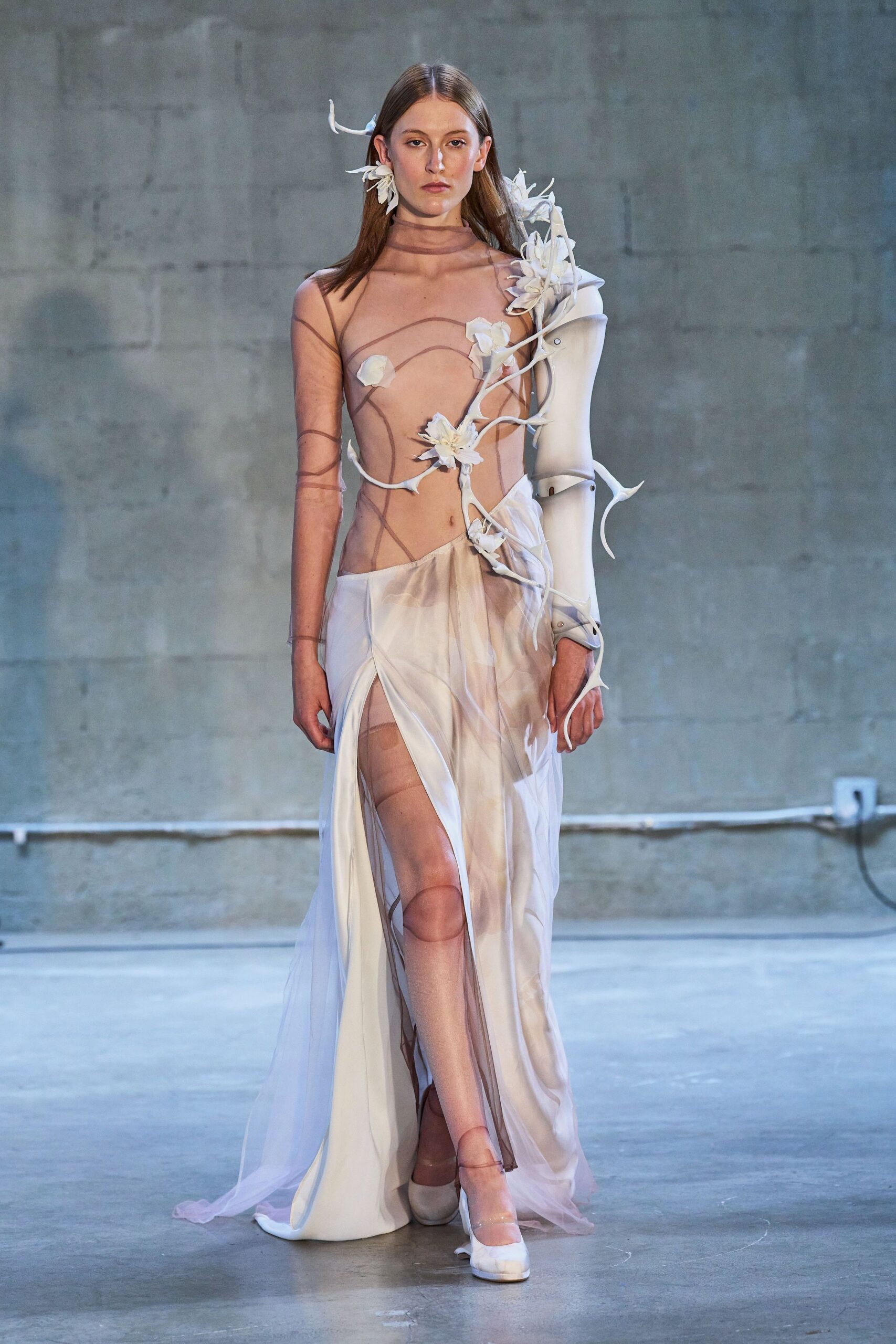 white chiffon sleeveless v-neck fitted draped embellished gown