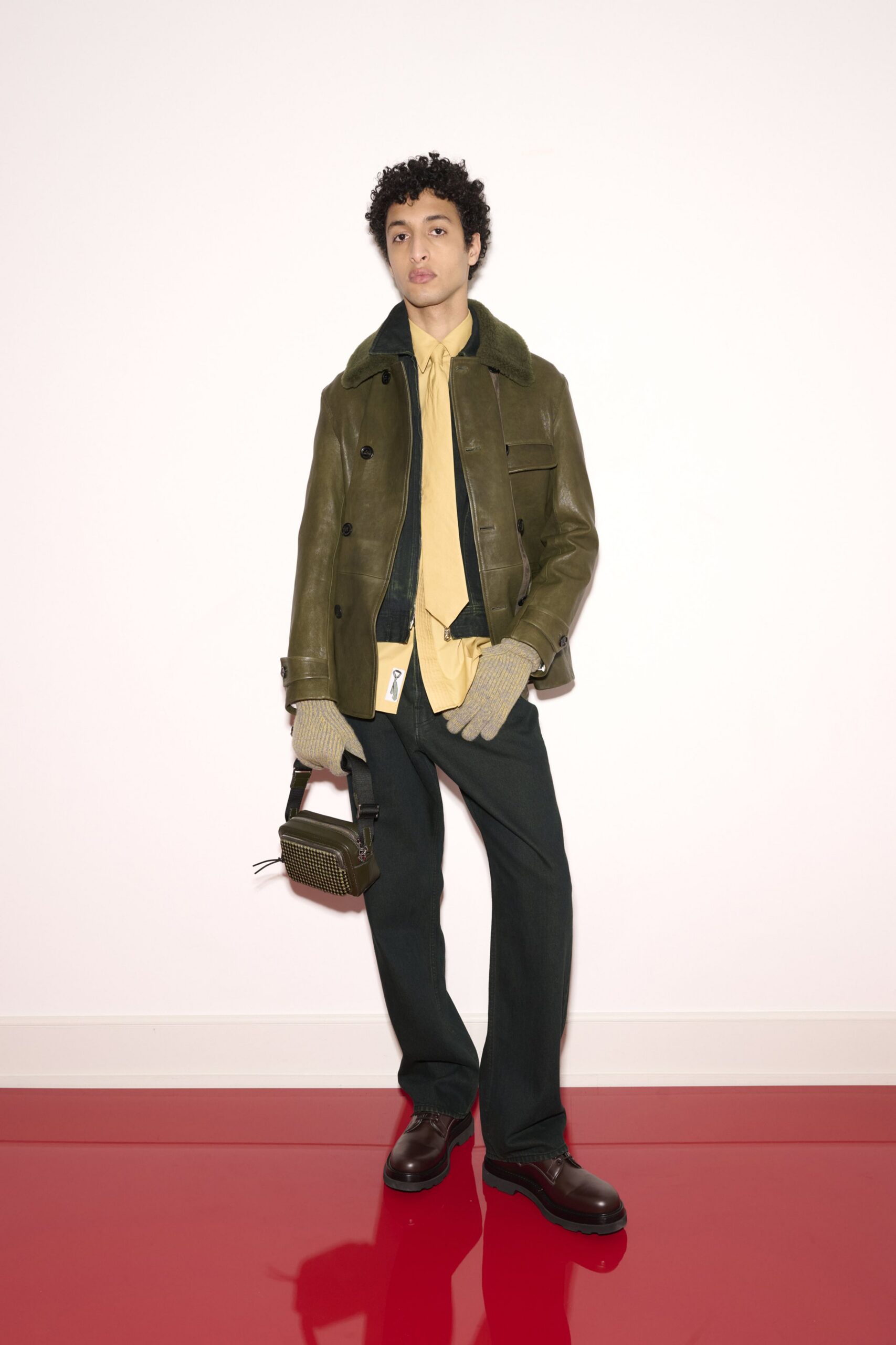 green leather long-sleeve collared fitted buttoned jacket