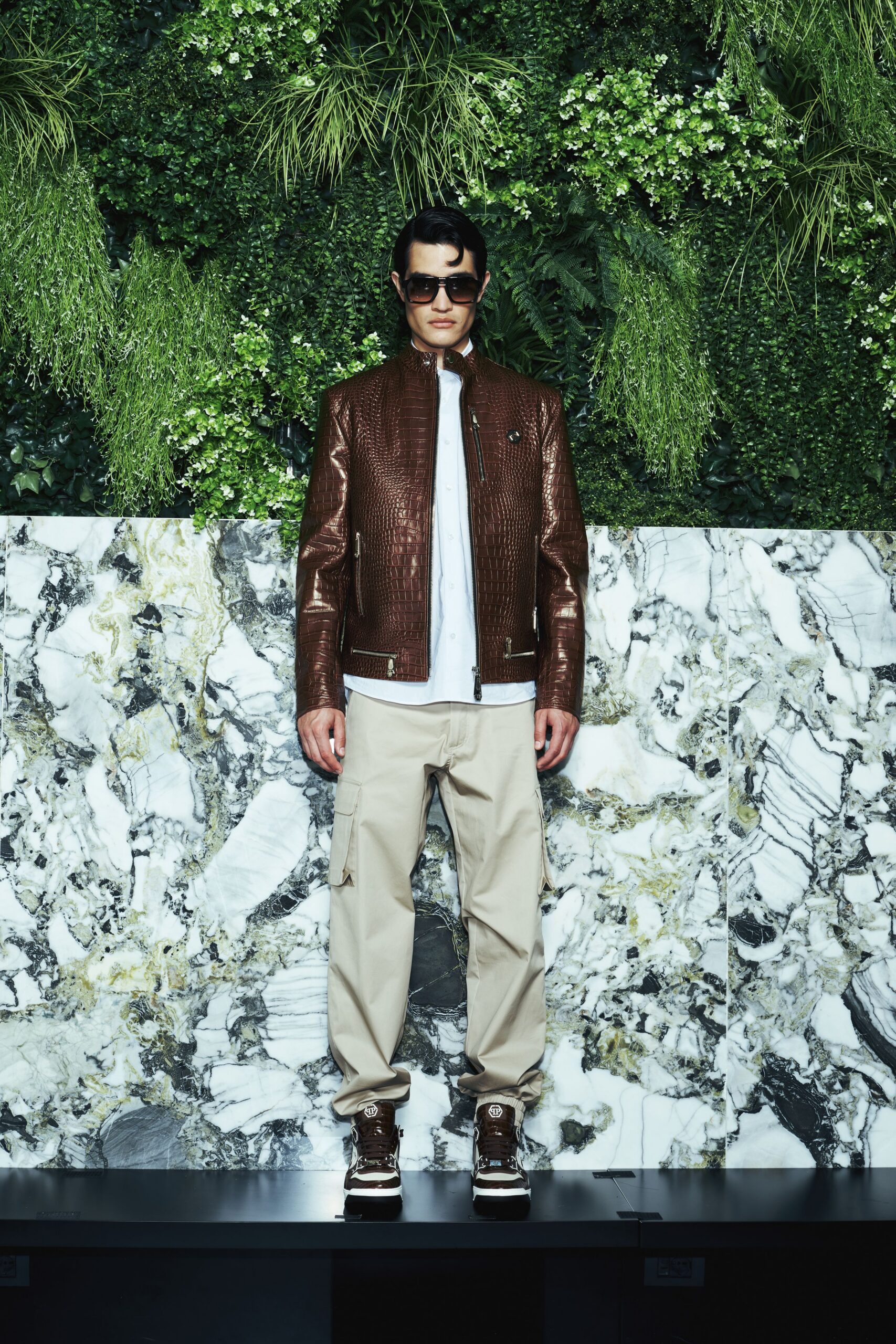 brown leather long-sleeve collared fitted zippered textured jacket