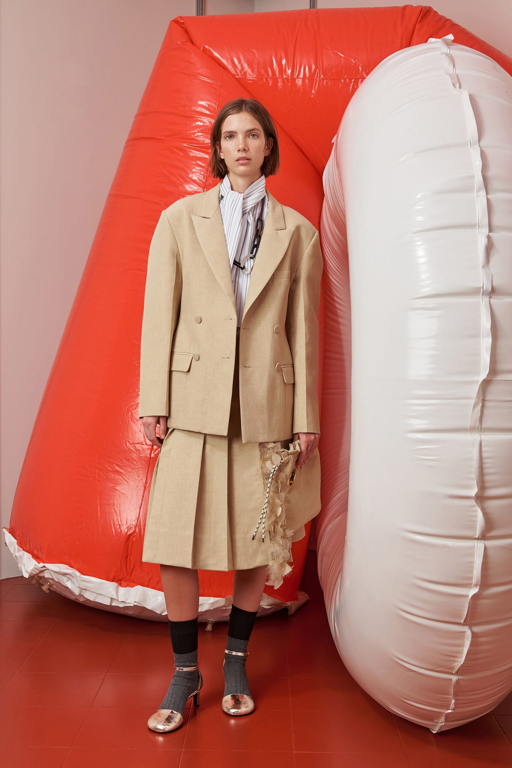 beige tailored blazer and skirt