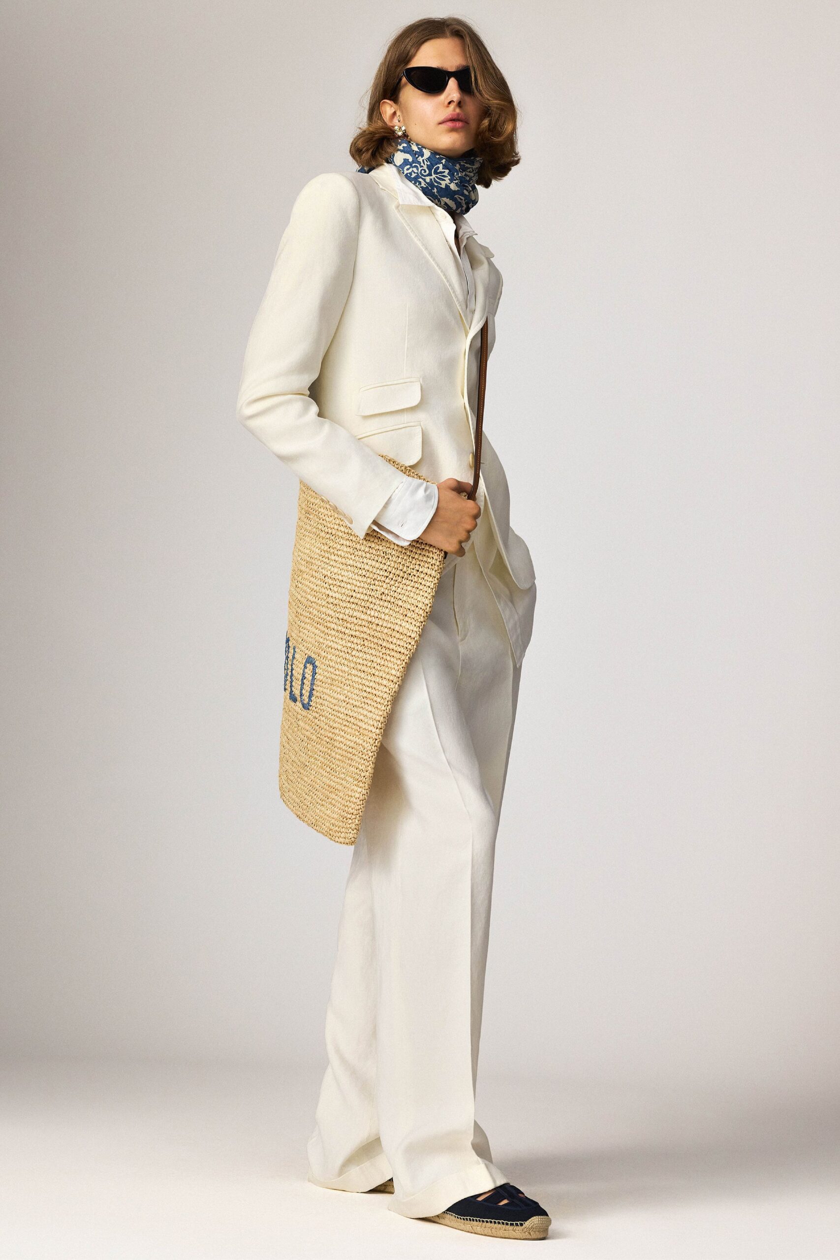 white tailored suit with scarf