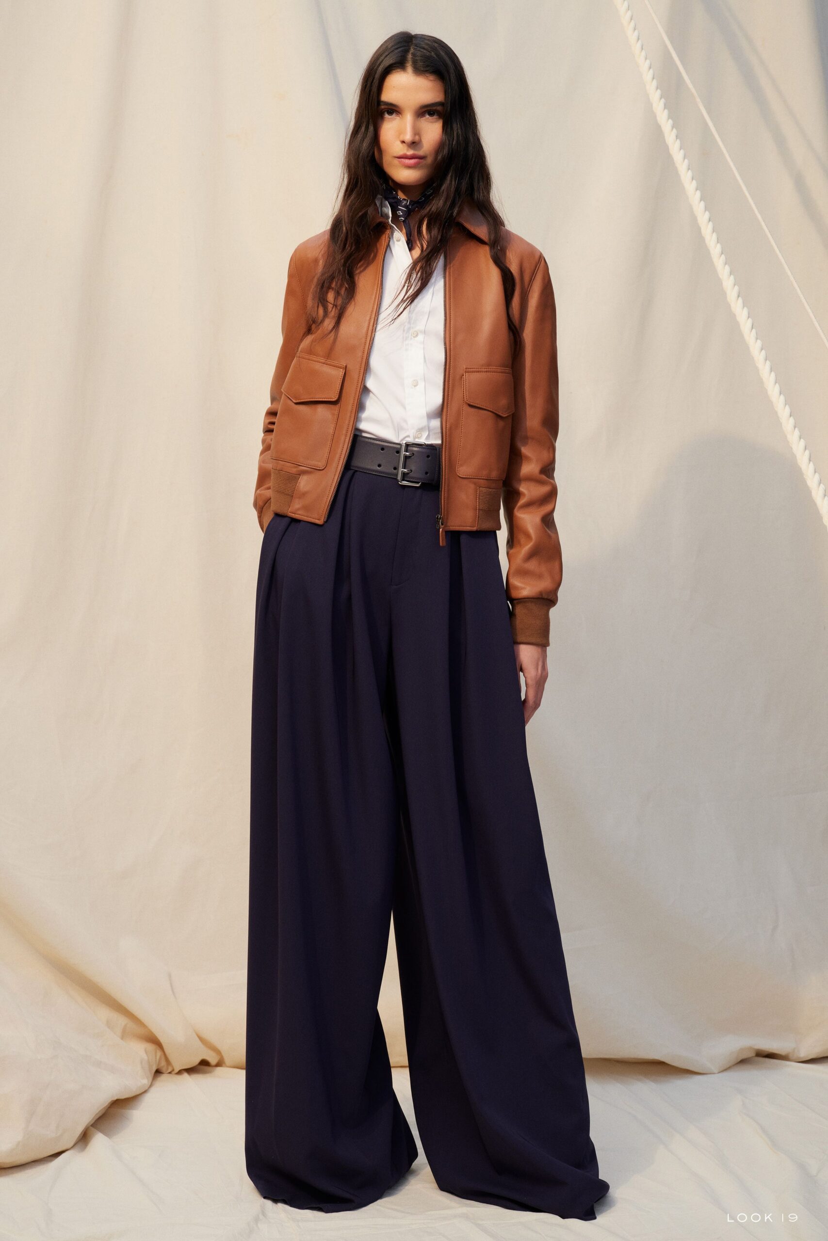 brown leather jacket with white shirt