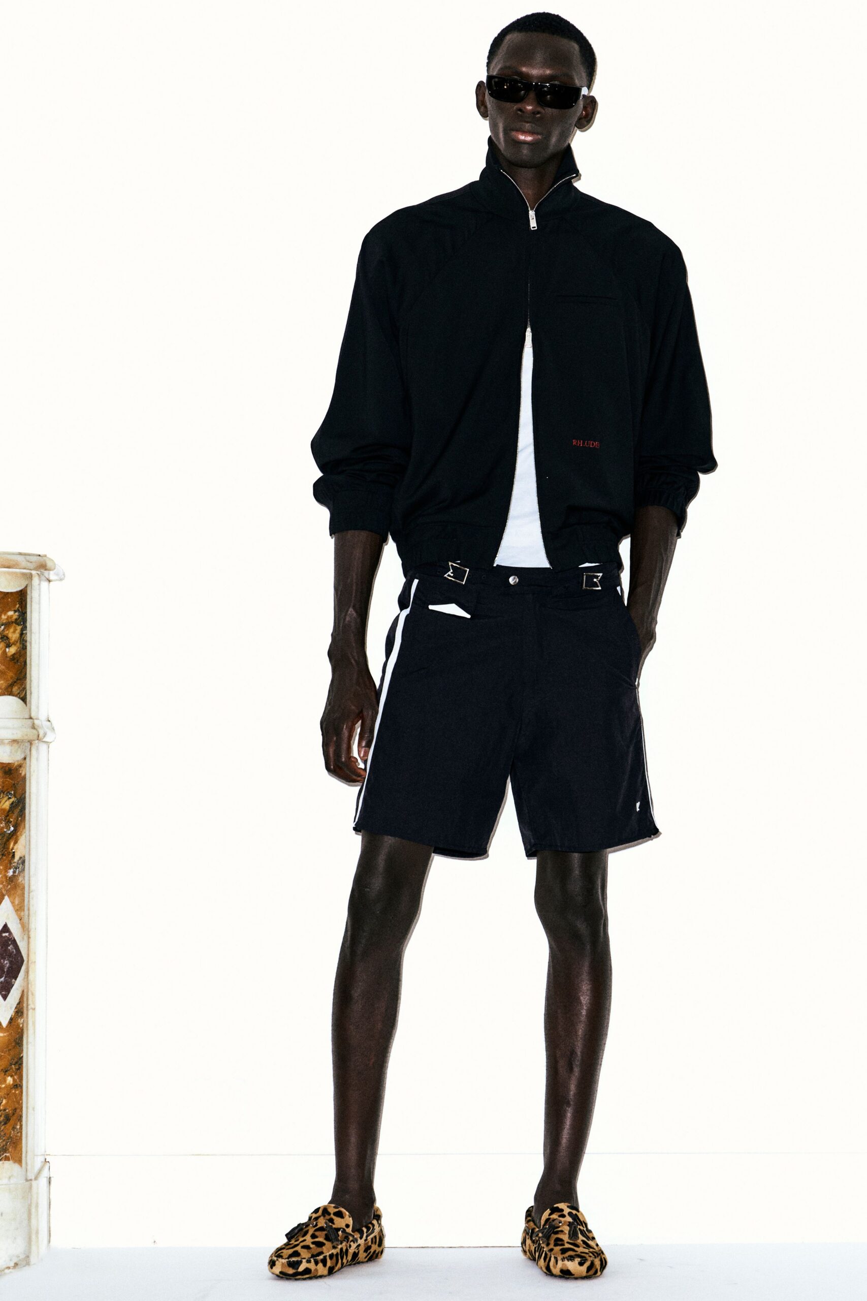 black fitted jacket with shorts