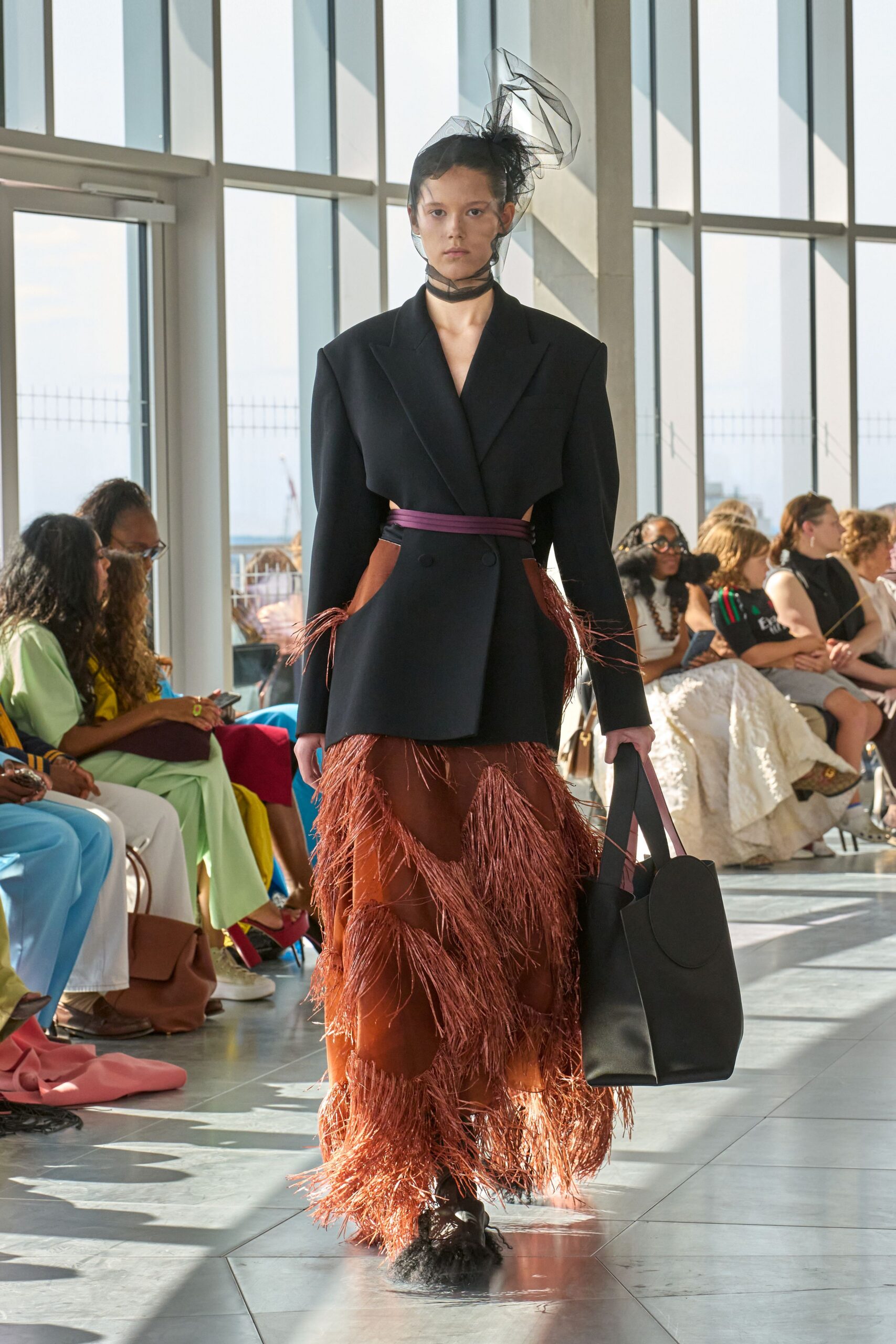black tailored blazer with fringed skirt