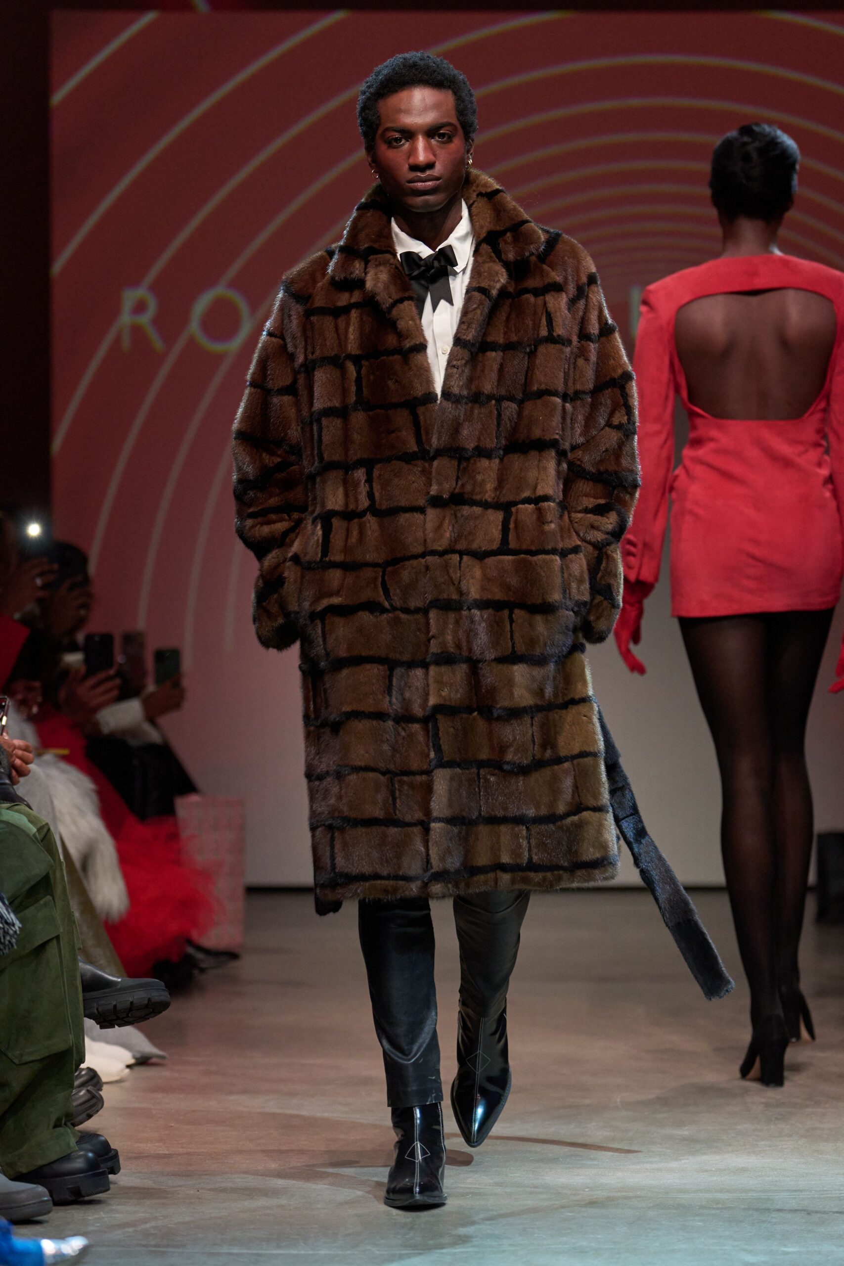 brown fur coat with black leather pants