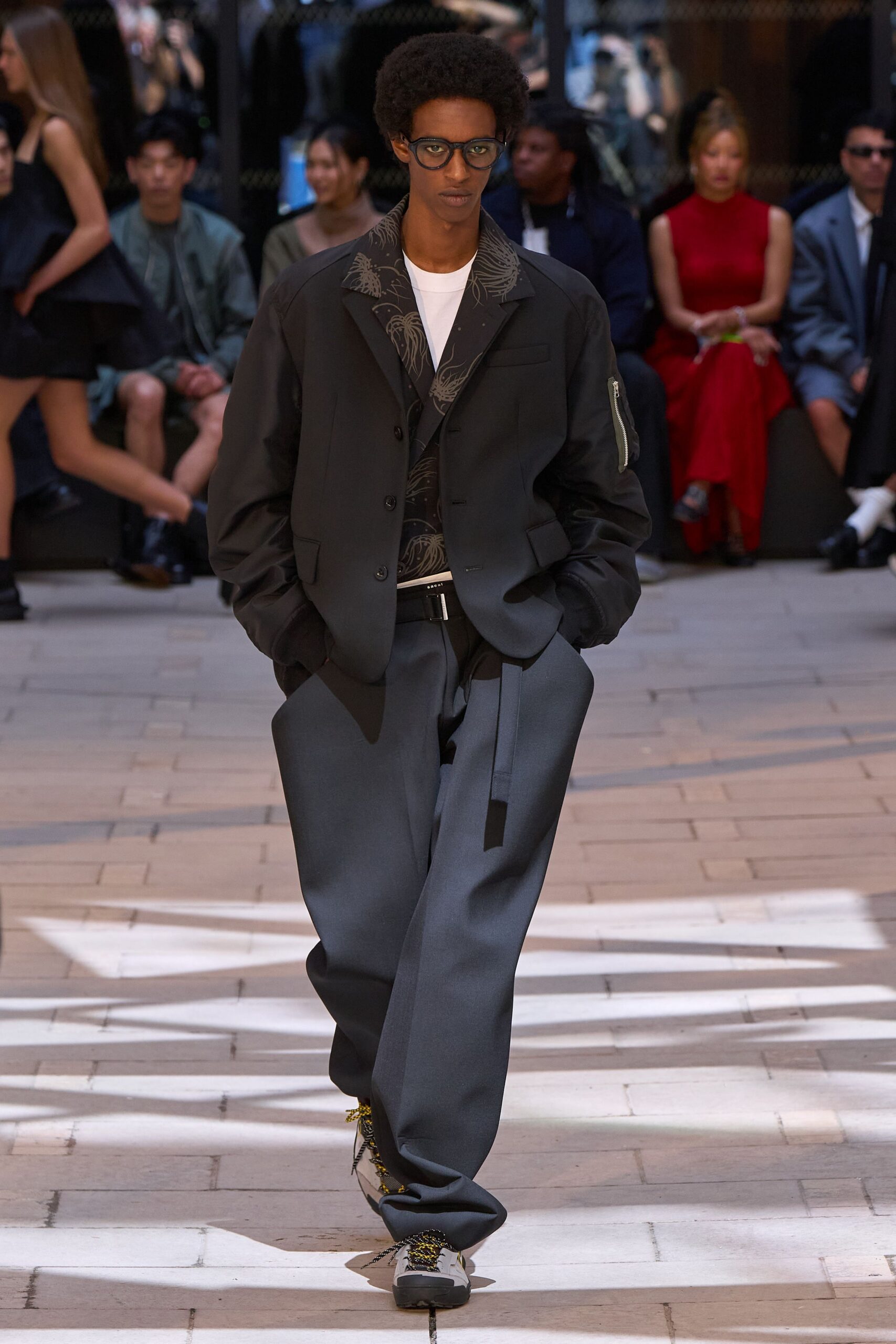 black relaxed jacket with gray pants